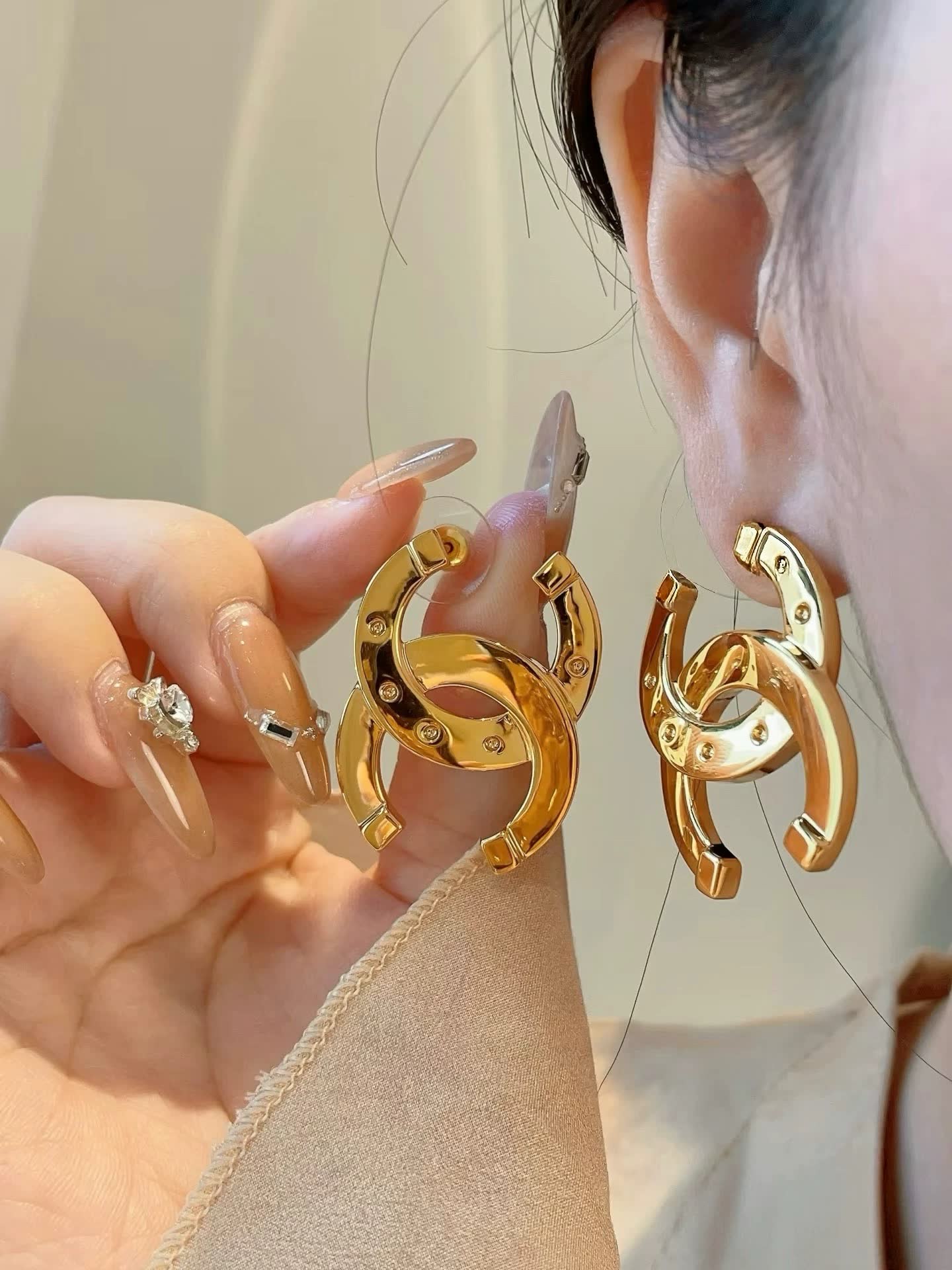 Chanel CC Logo Gold Tone Stud Earrings