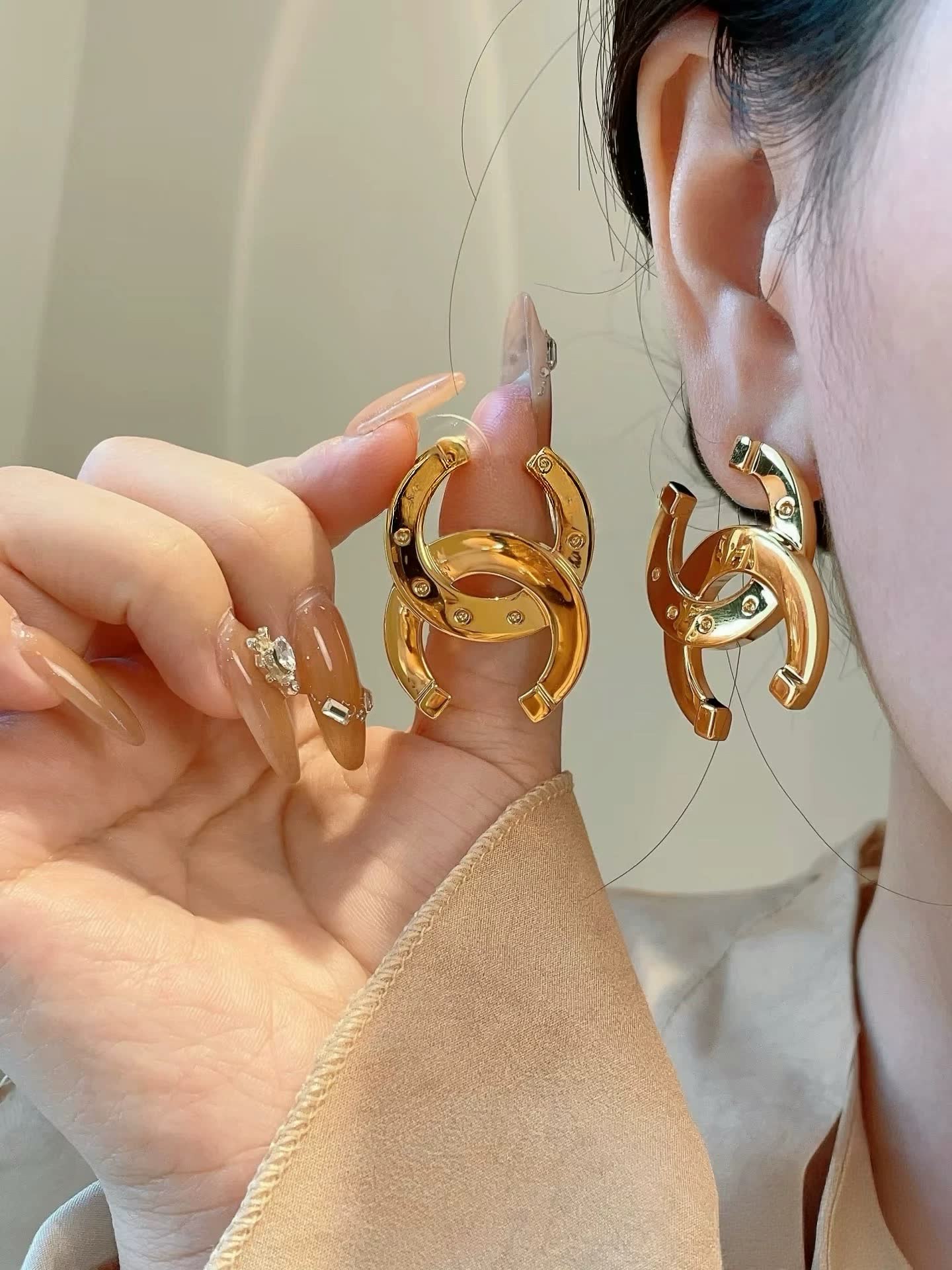 Chanel CC Logo Gold Tone Stud Earrings