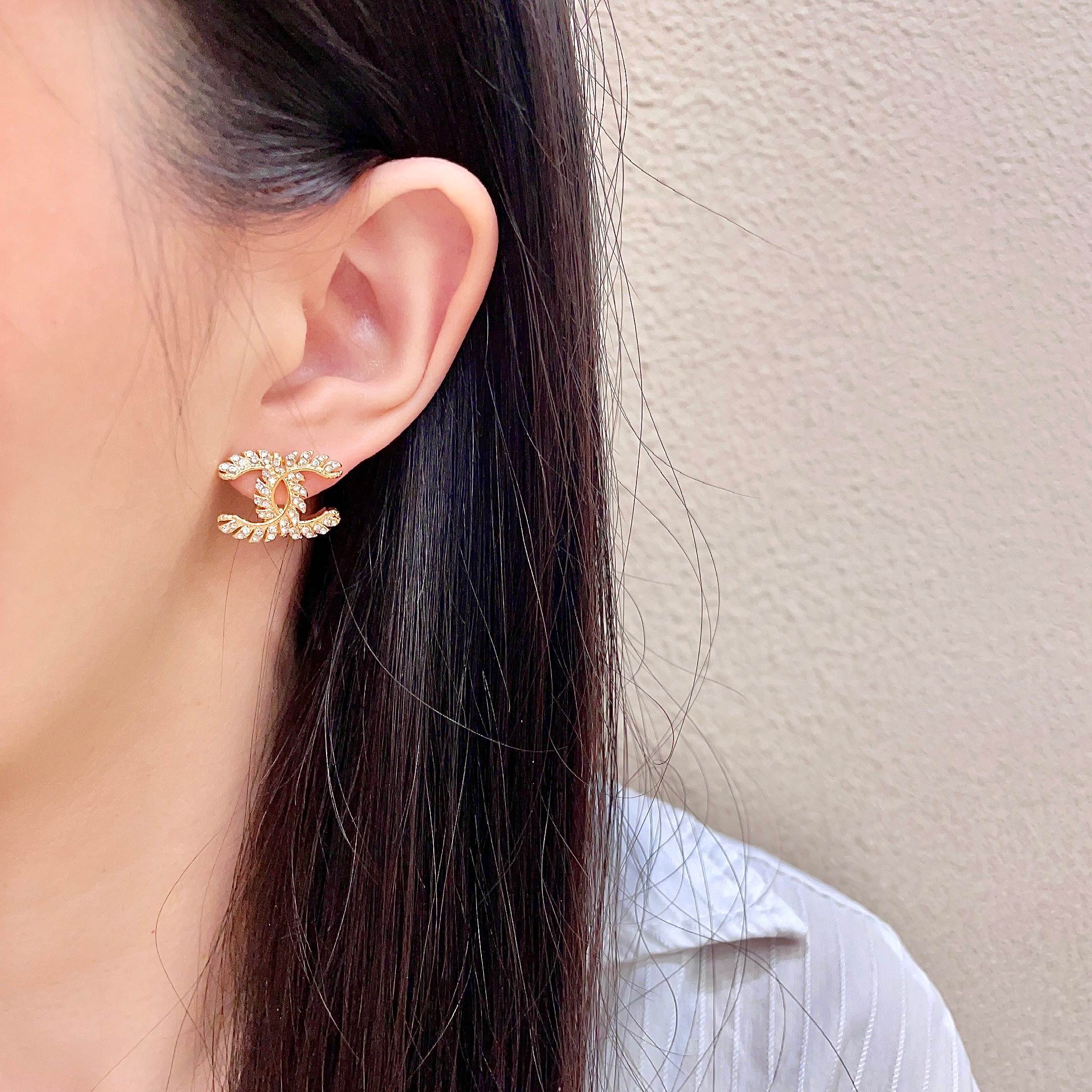Chanel CC Logo Gold Tone Stud Earrings