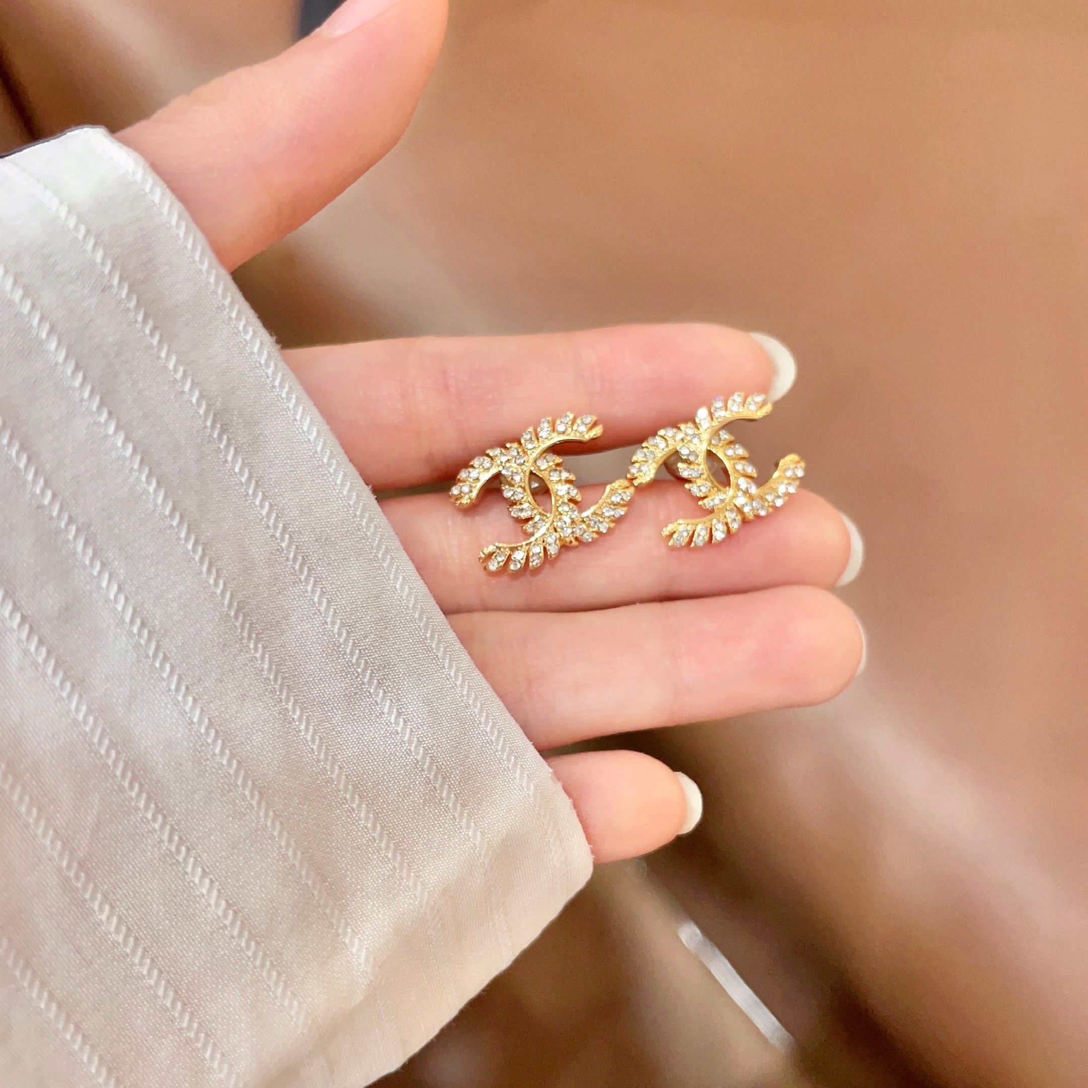 Chanel CC Logo Gold Tone Stud Earrings