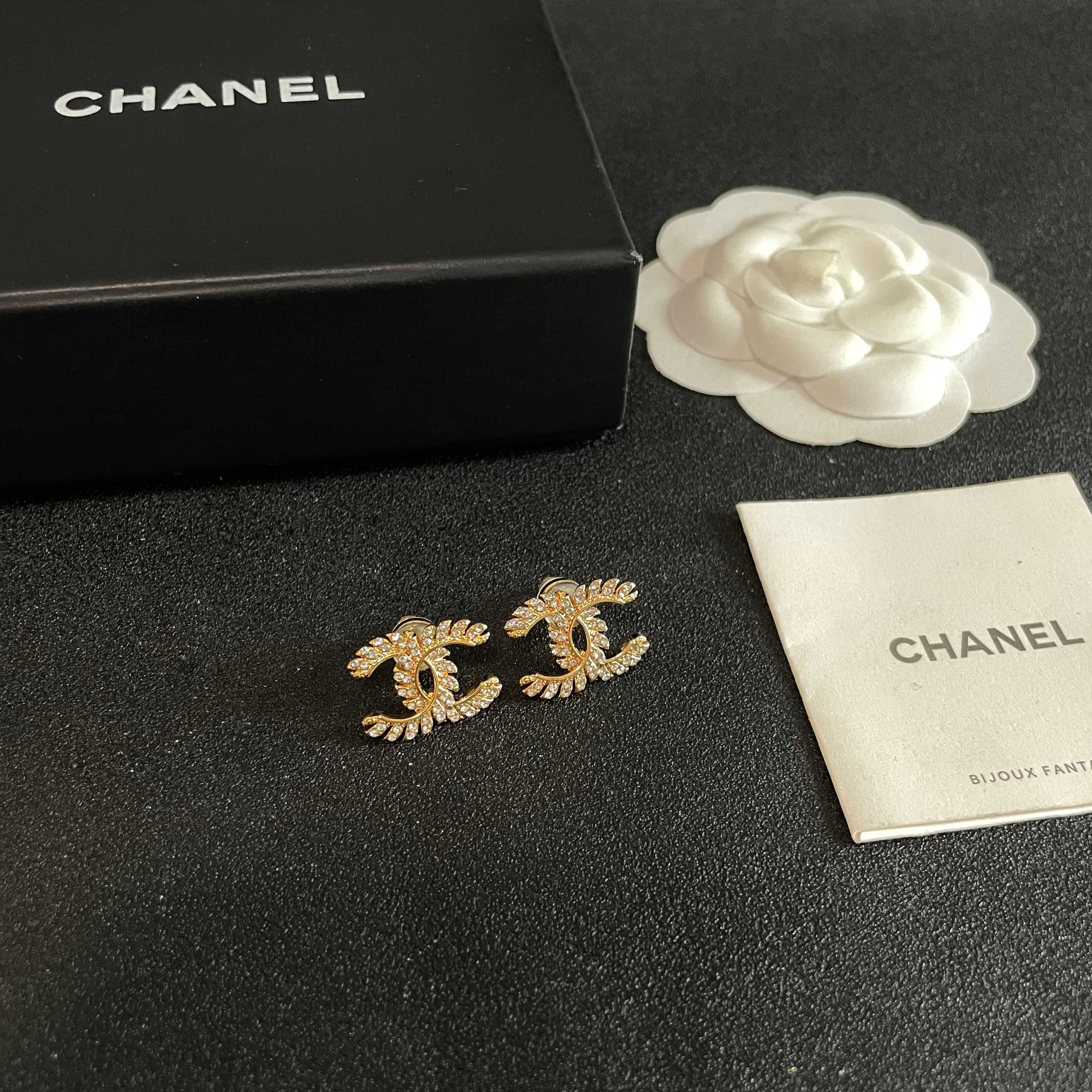 Chanel CC Logo Gold Tone Stud Earrings