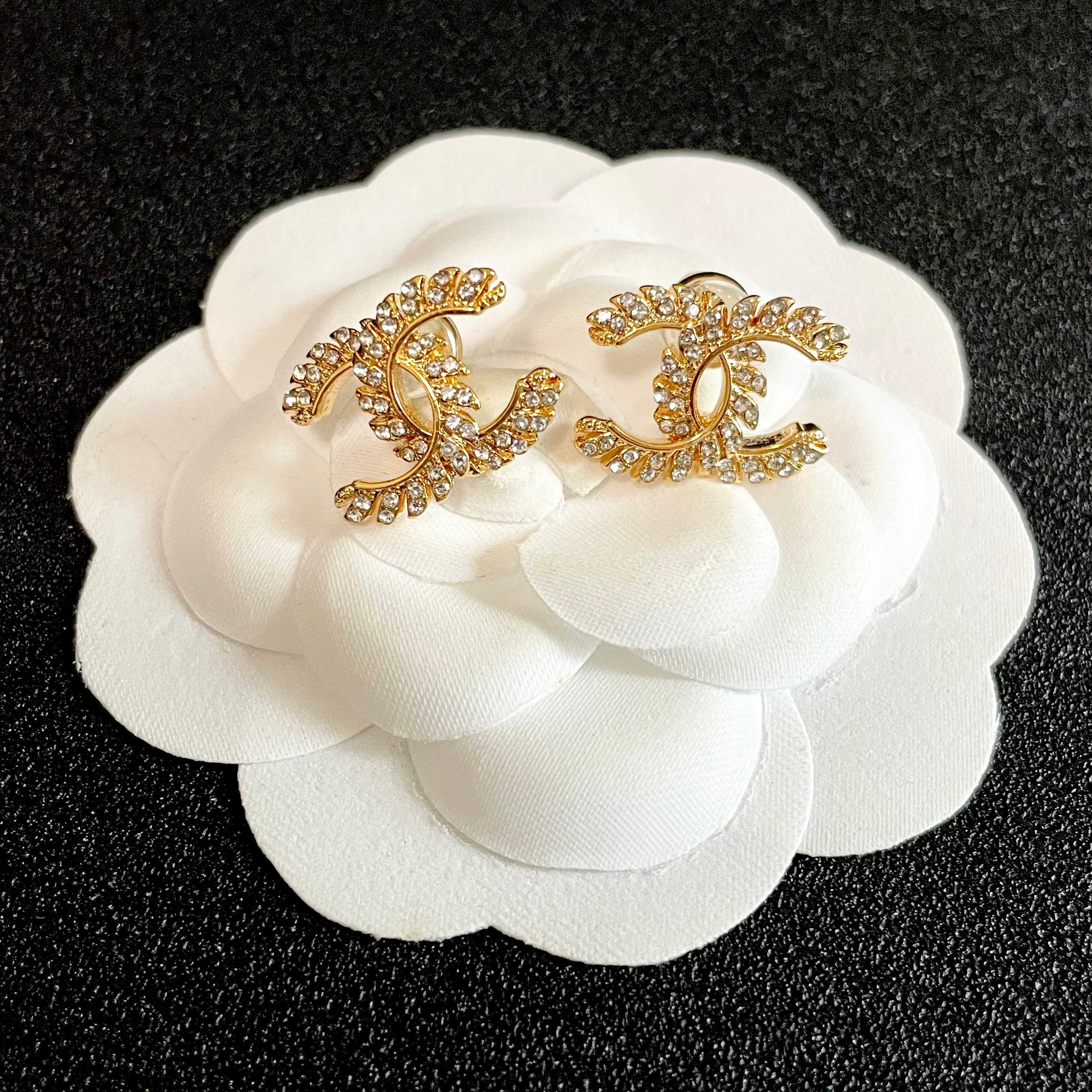 Chanel CC Logo Gold Tone Stud Earrings