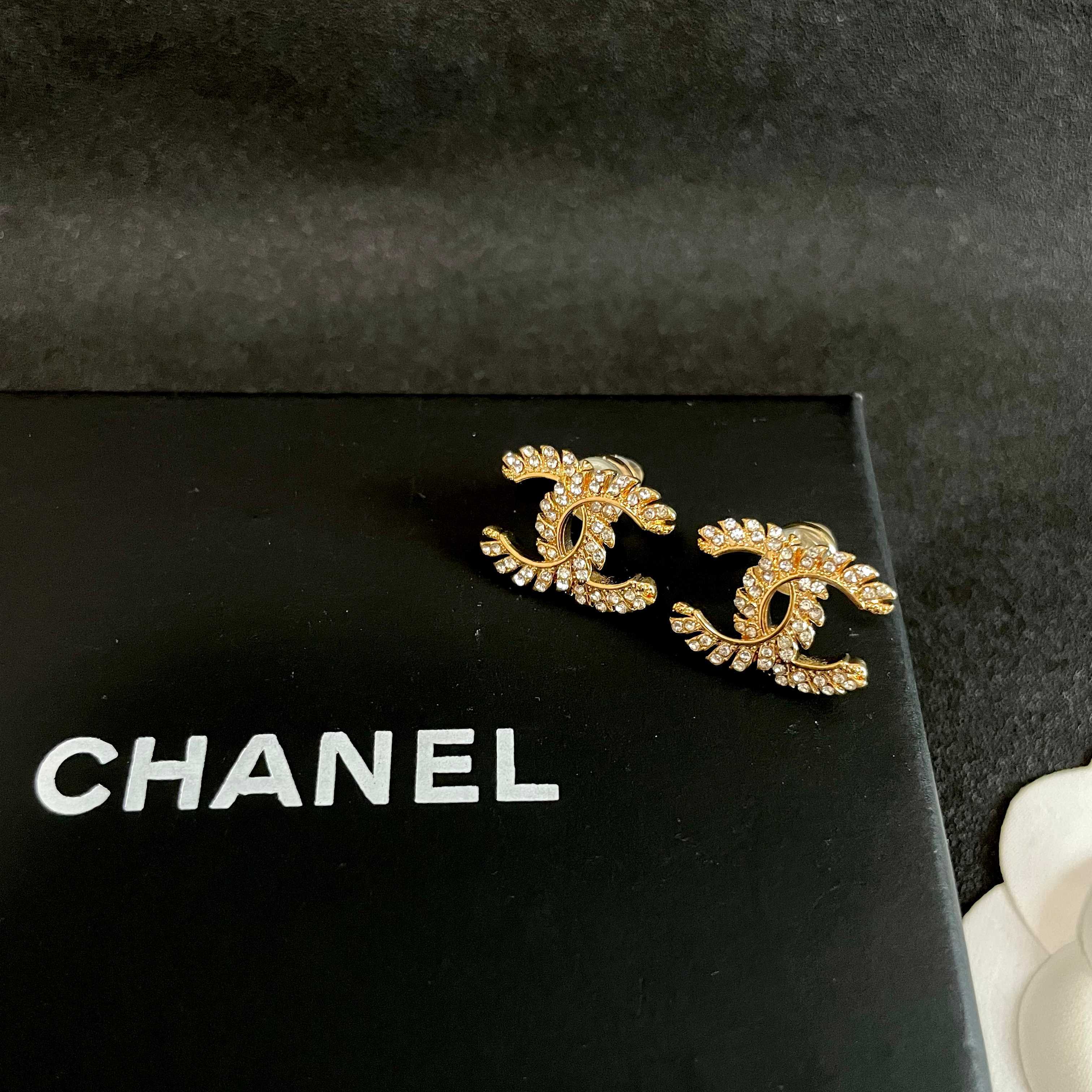 Chanel CC Logo Gold Tone Stud Earrings