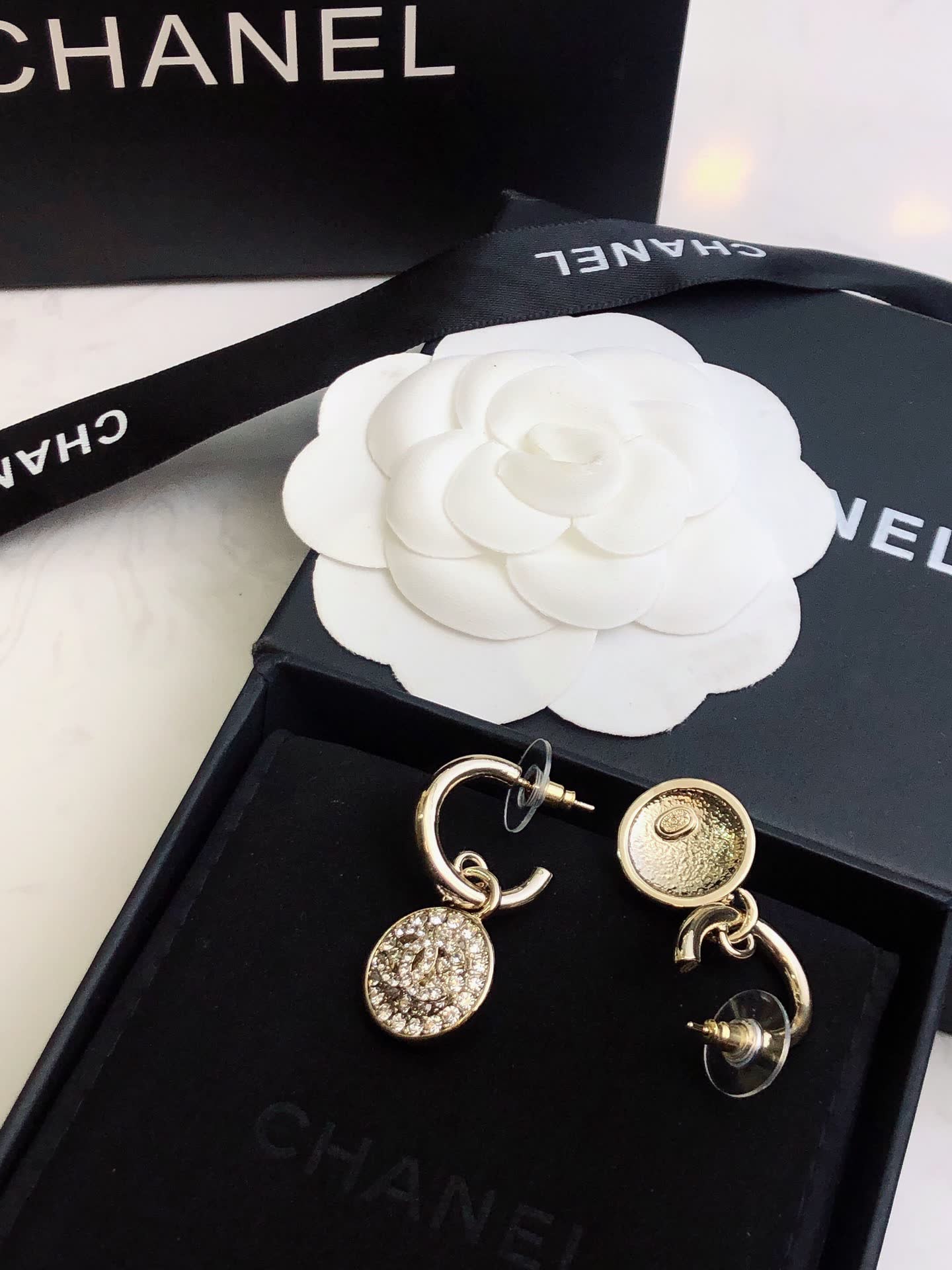 Chanel Gold Tone Crystal Lock Earrings