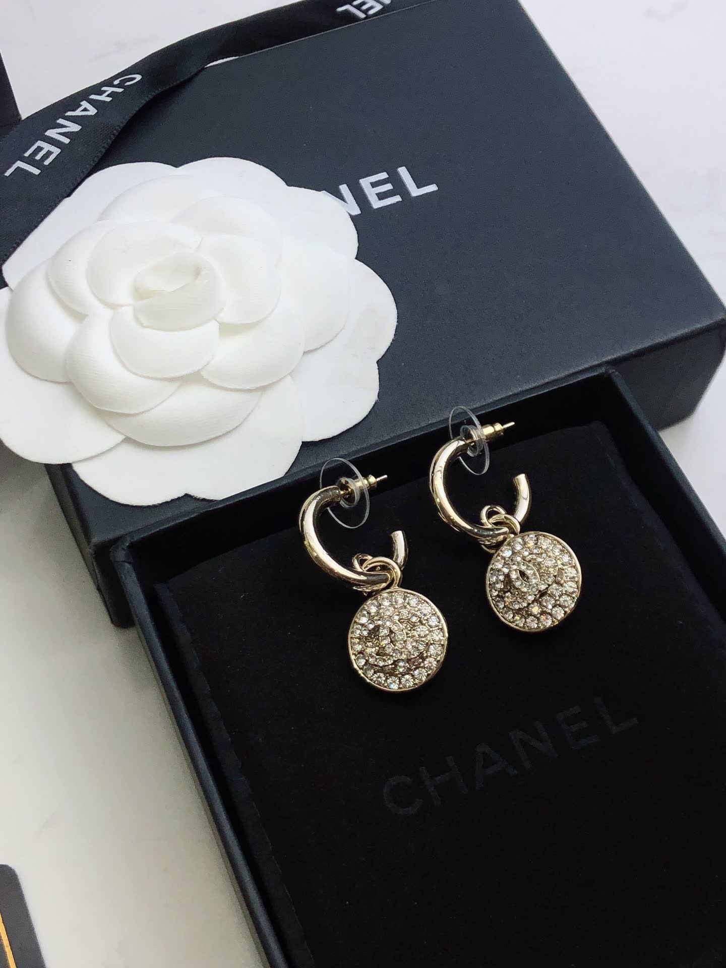 Chanel Gold Tone Crystal Lock Earrings