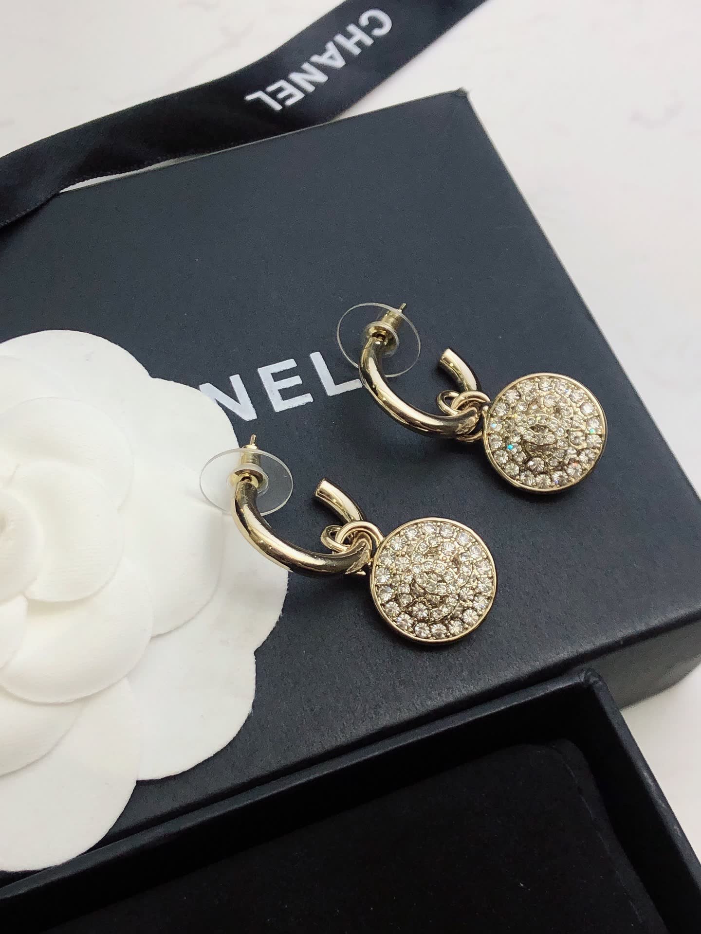 Chanel Gold Tone Crystal Lock Earrings