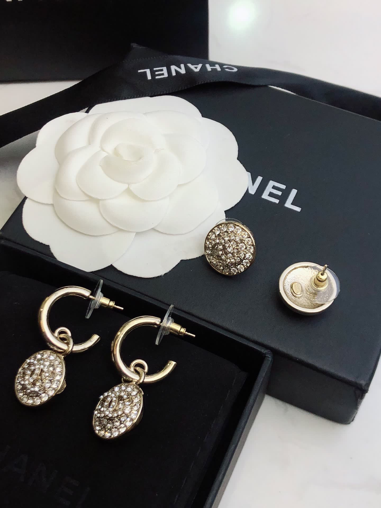 Chanel Gold Tone Crystal Lock Earrings
