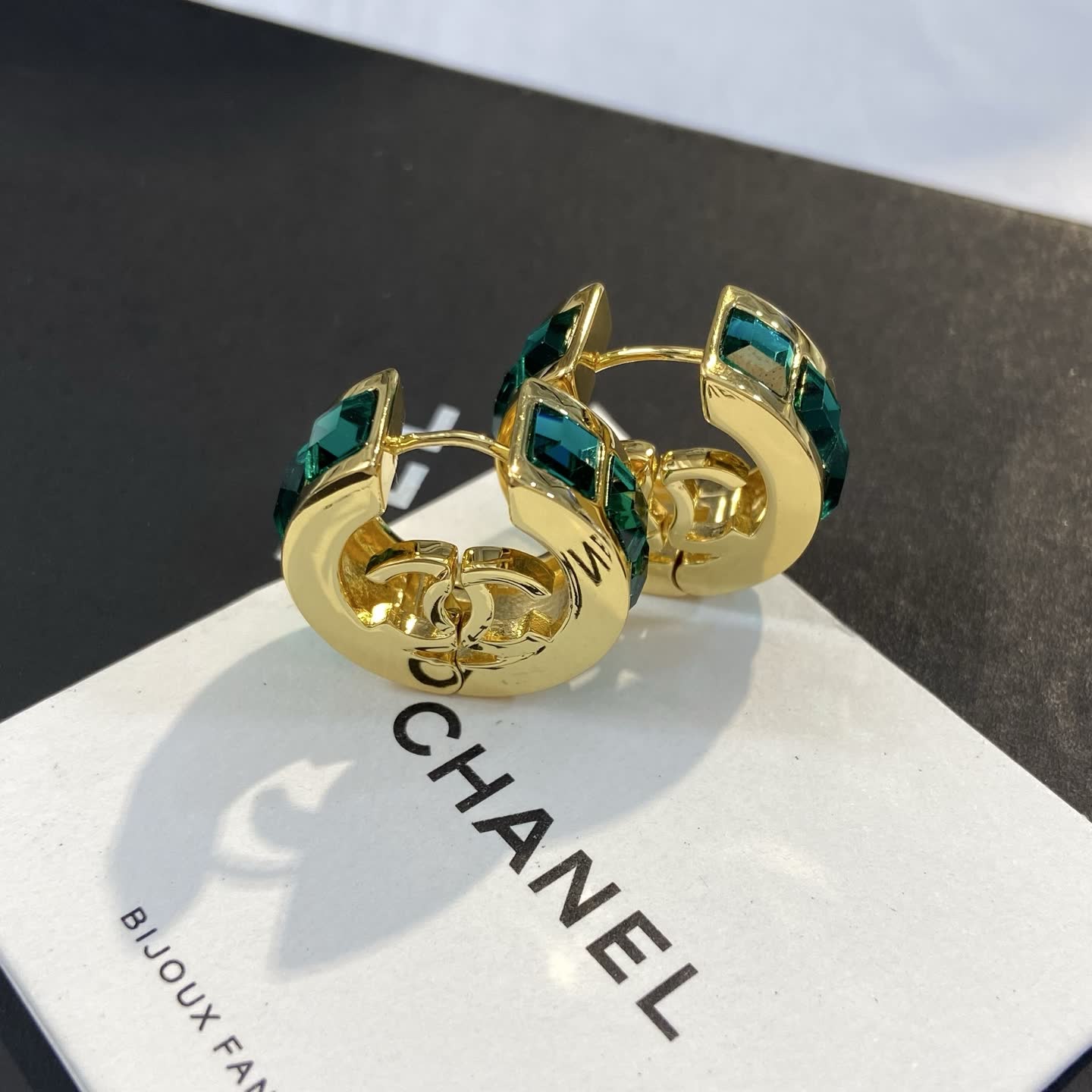 Chanel Gold Tone Green Crystal Hoop Earrings Chanel Gold Tone Green Crystal Hoop Earrings