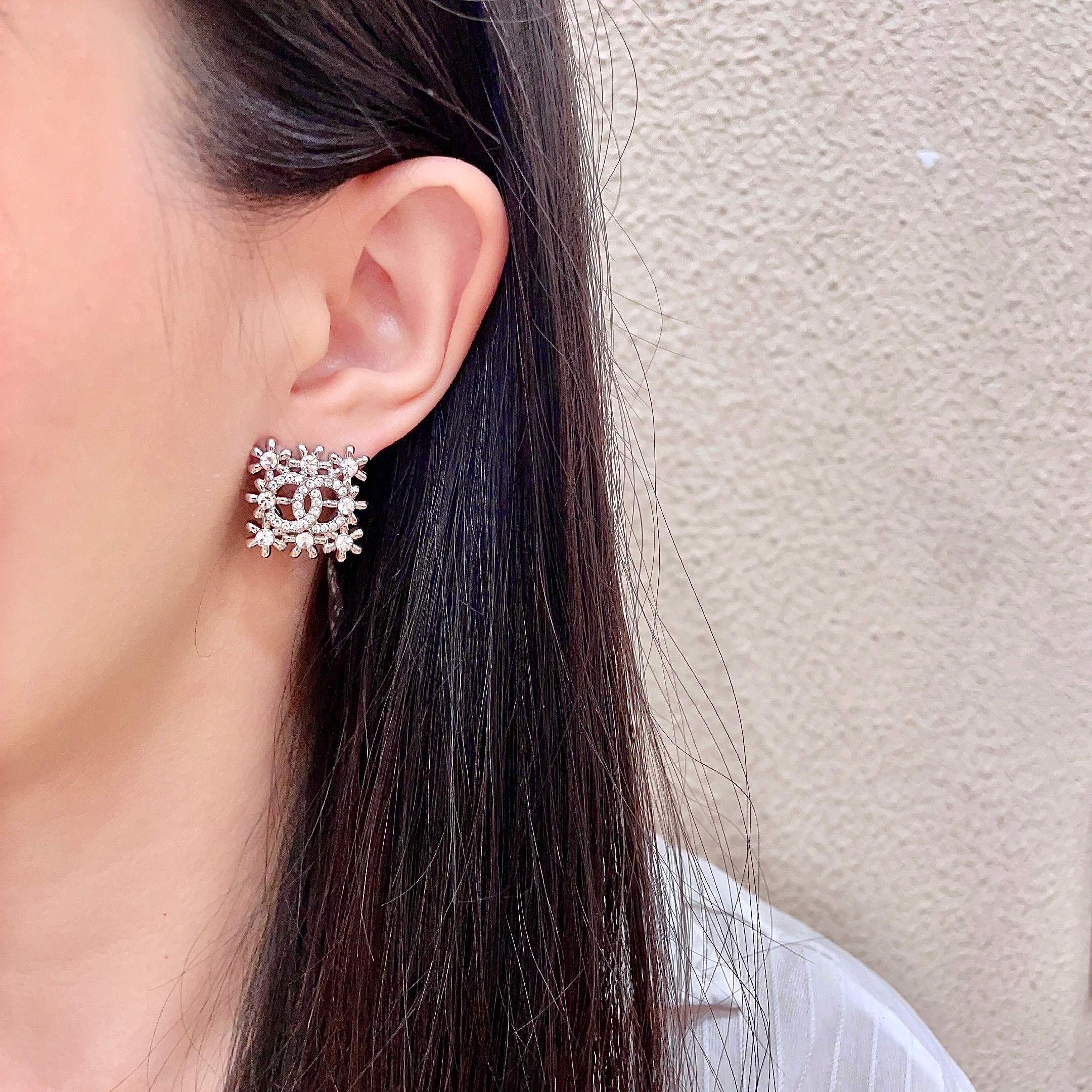 Chanel CC Logo Snowflake Stud Earrings