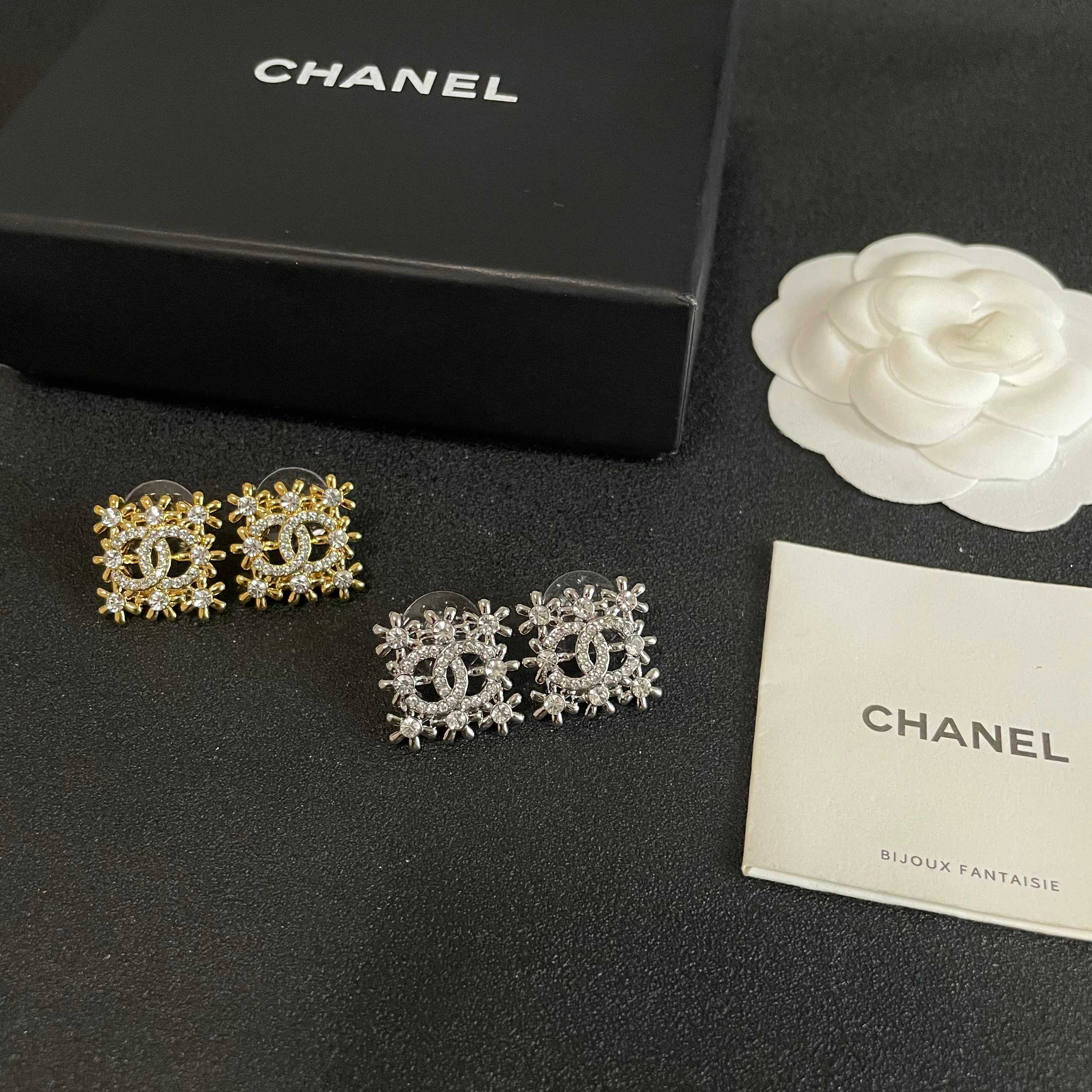 Chanel CC Logo Snowflake Stud Earrings