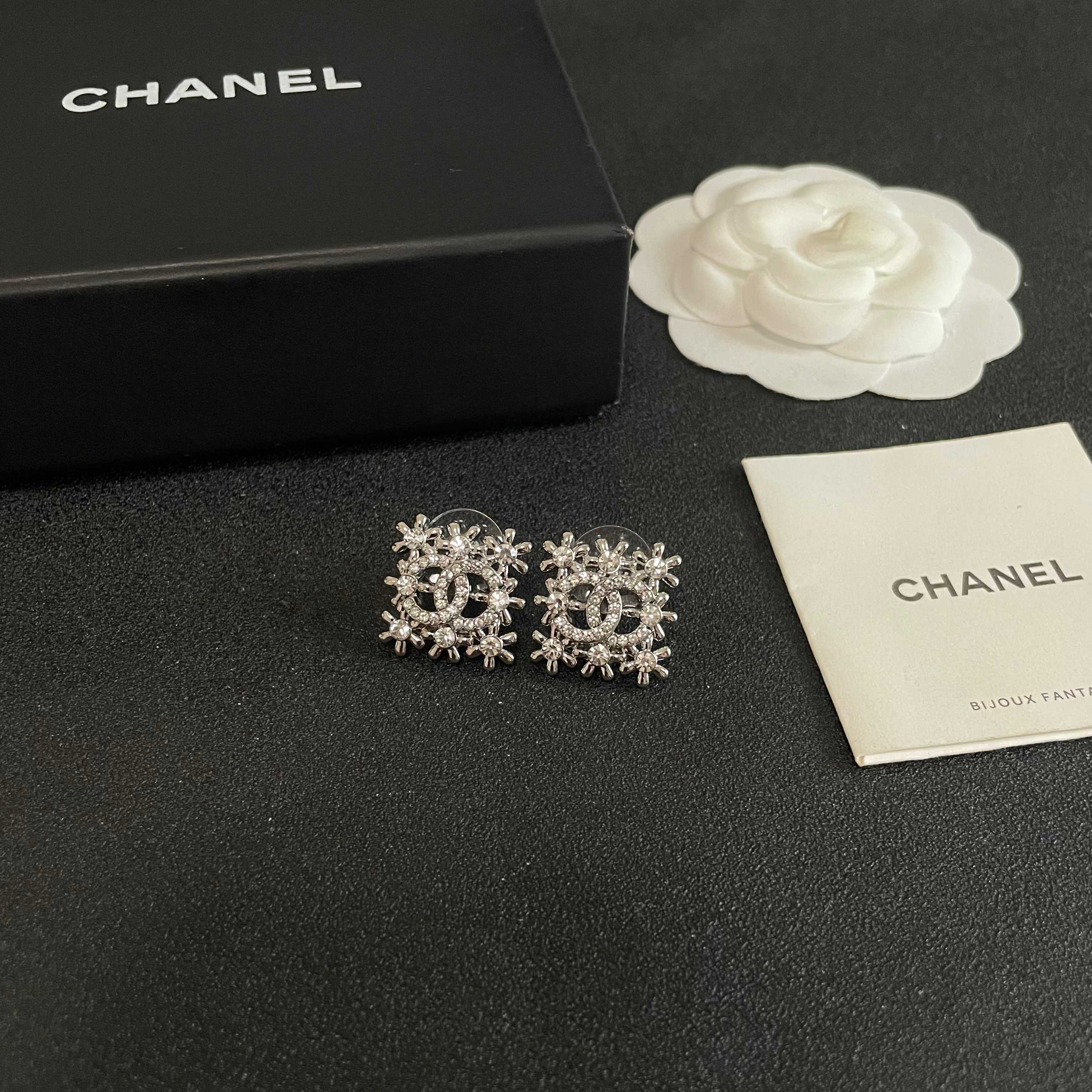Chanel CC Logo Snowflake Stud Earrings