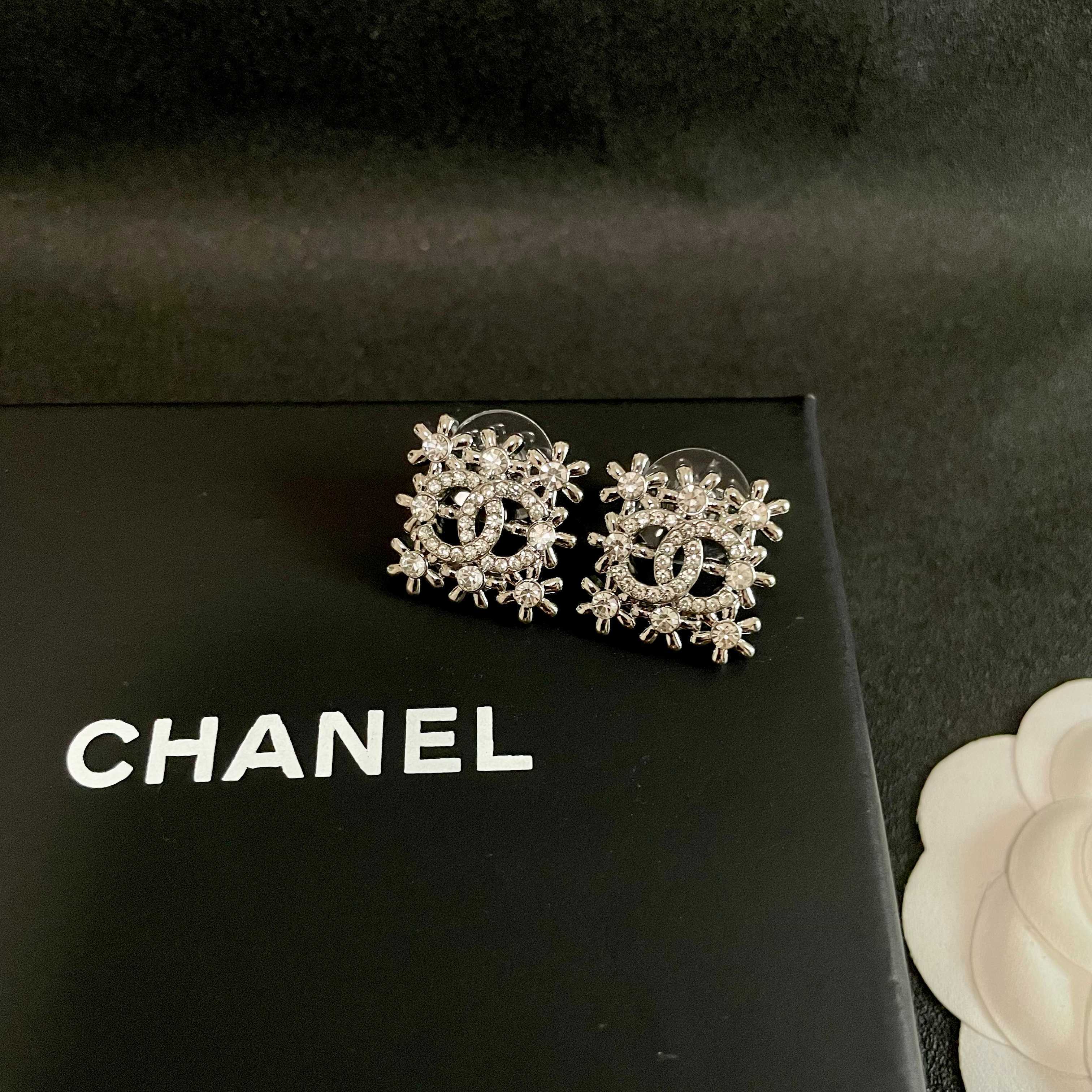 Chanel CC Logo Snowflake Stud Earrings