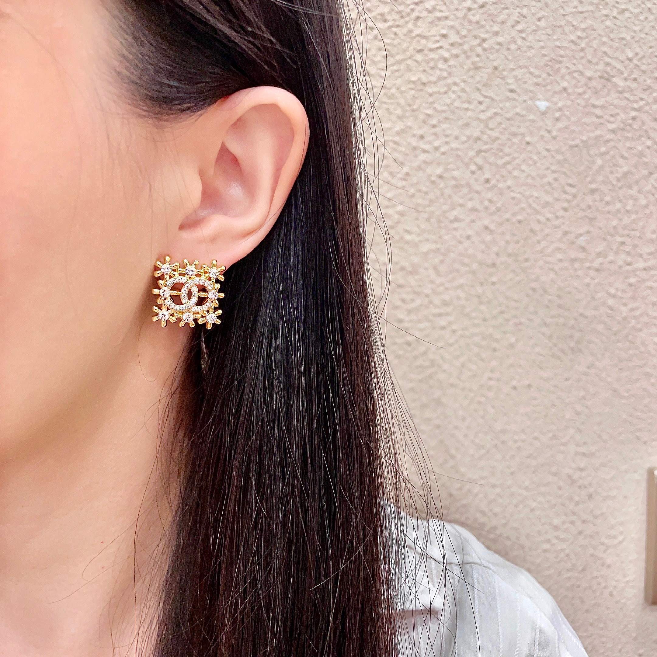 Chanel CC Logo Snowflake Earrings