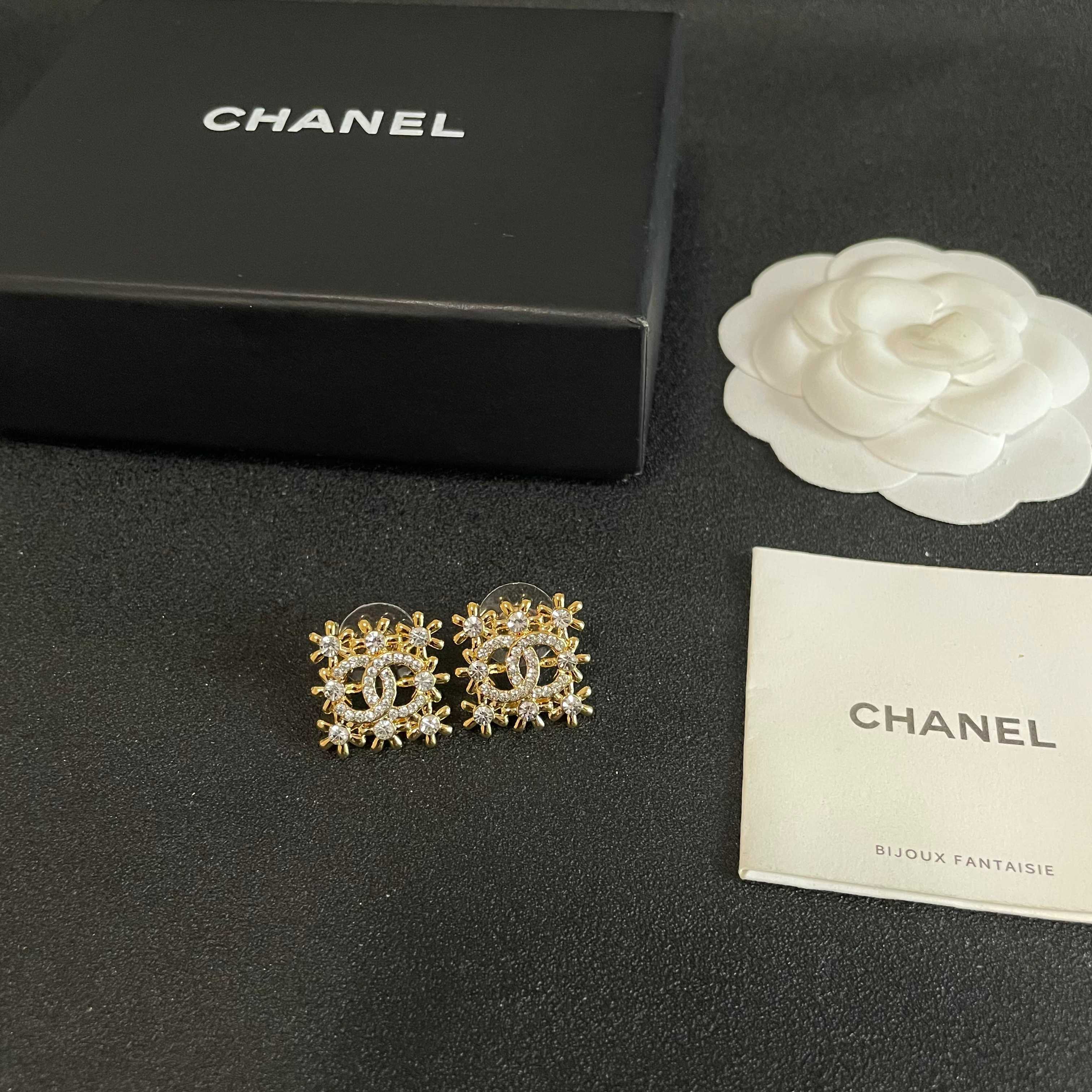 Chanel CC Logo Snowflake Earrings