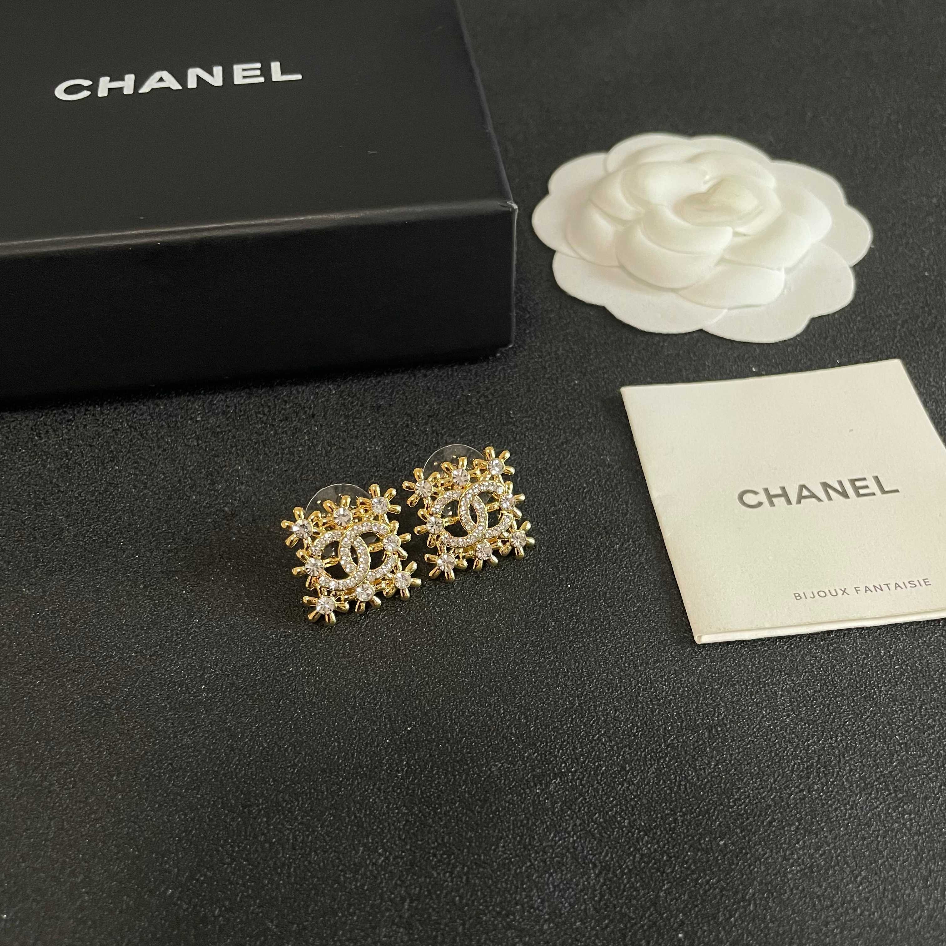 Chanel CC Logo Snowflake Earrings