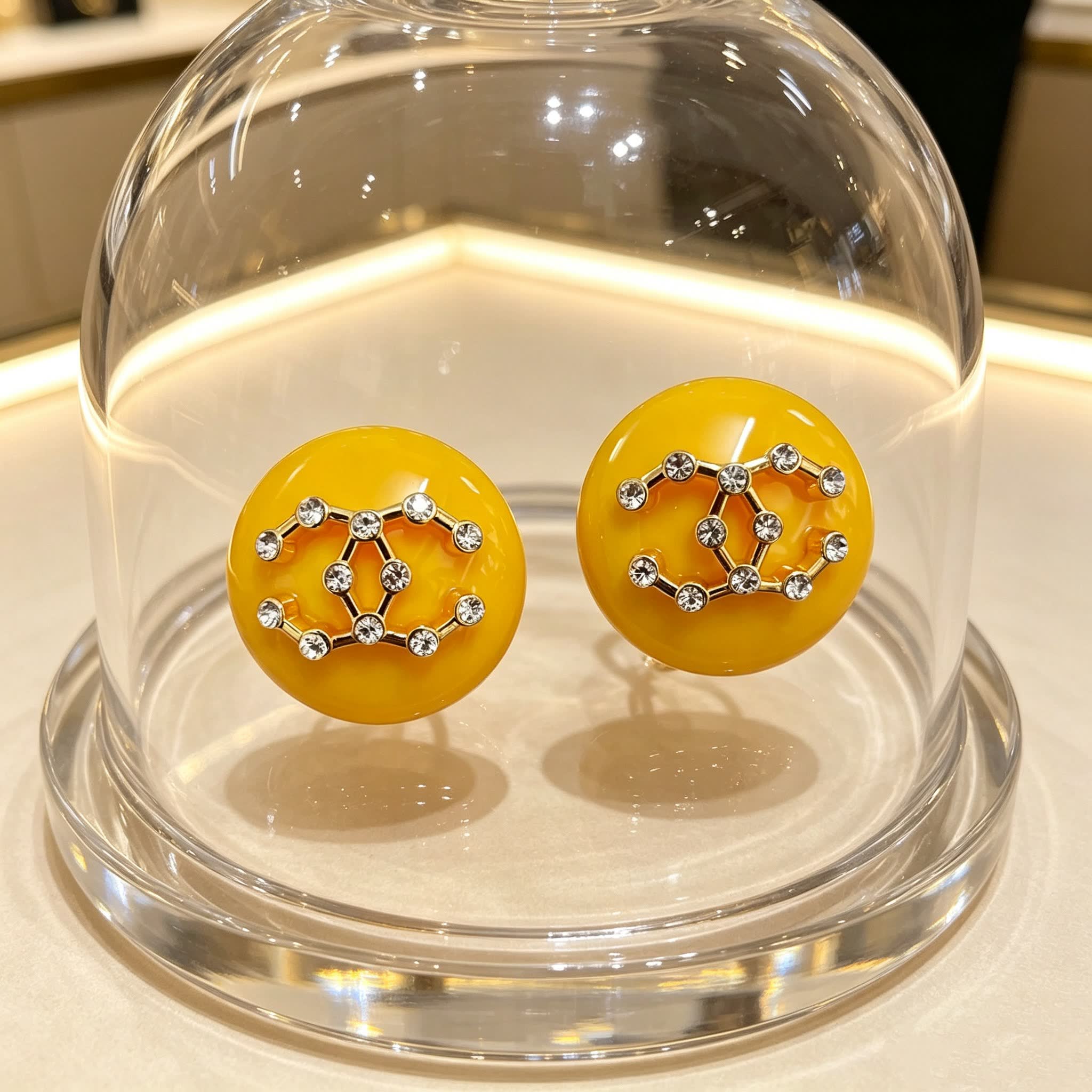 Chanel Yellow Round Earrings with White Floral Design