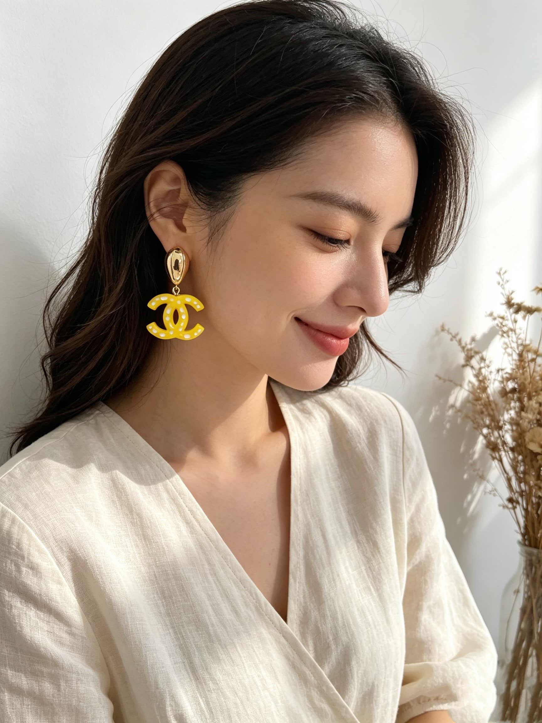 Chanel CC Logo Yellow Earrings