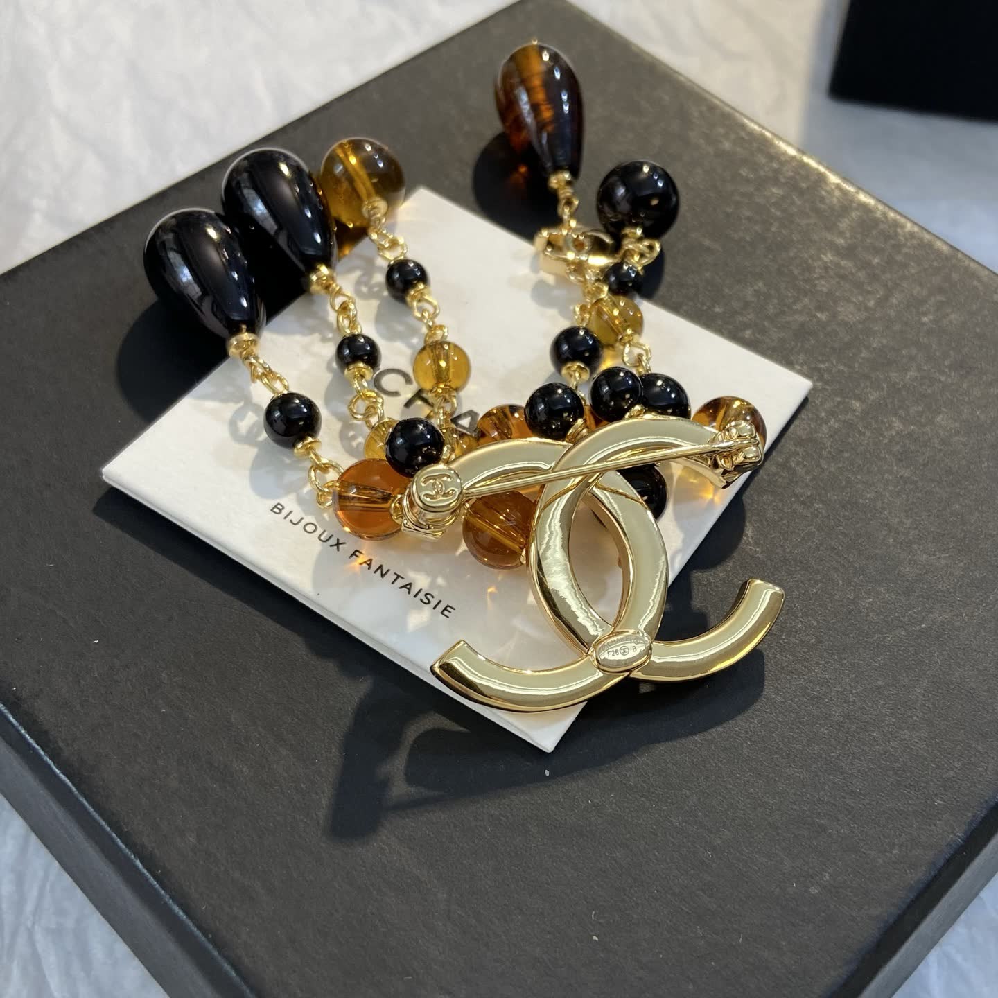 Chanel CC Logo Earrings with Black and Brown Beads