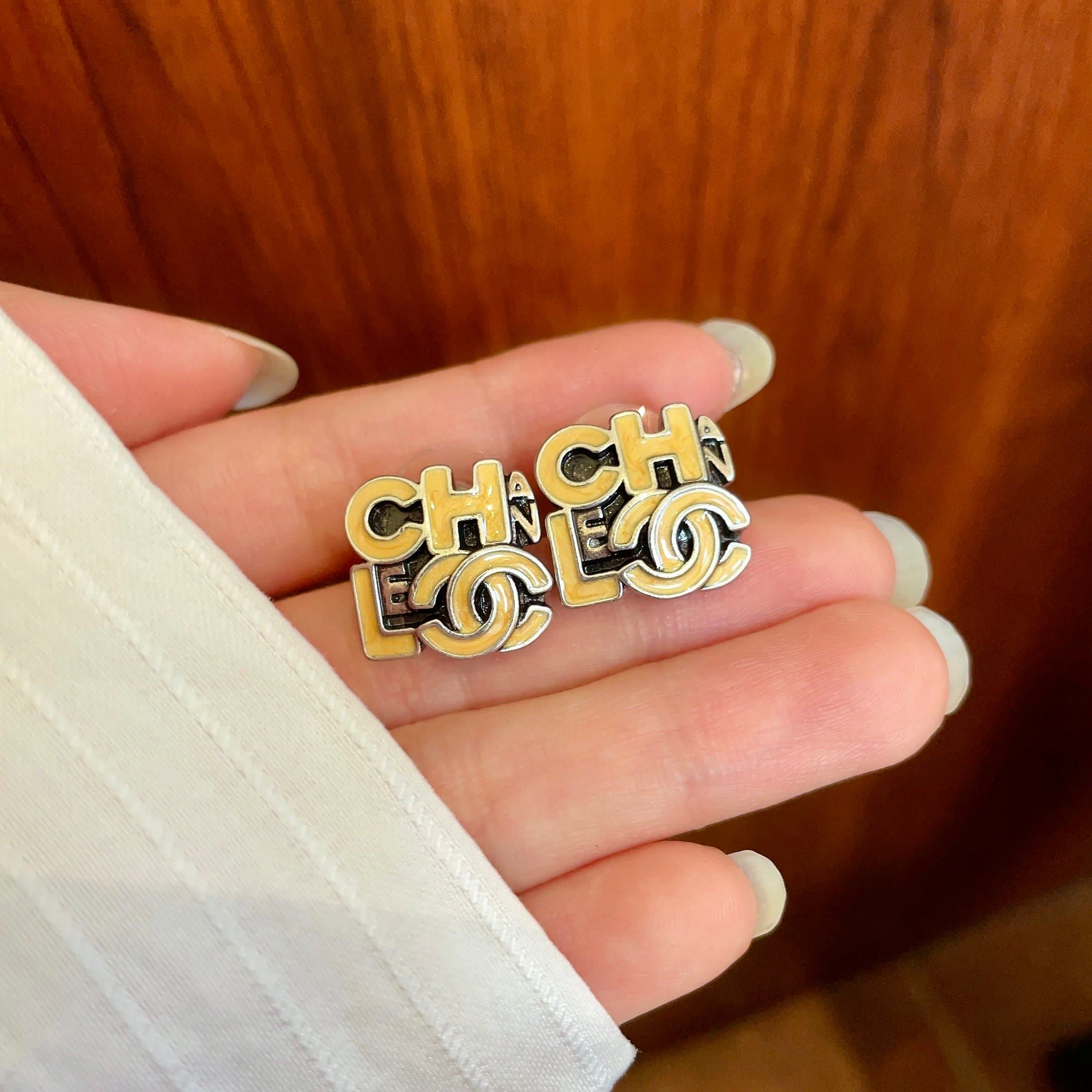 Chanel Logo Stud Earrings