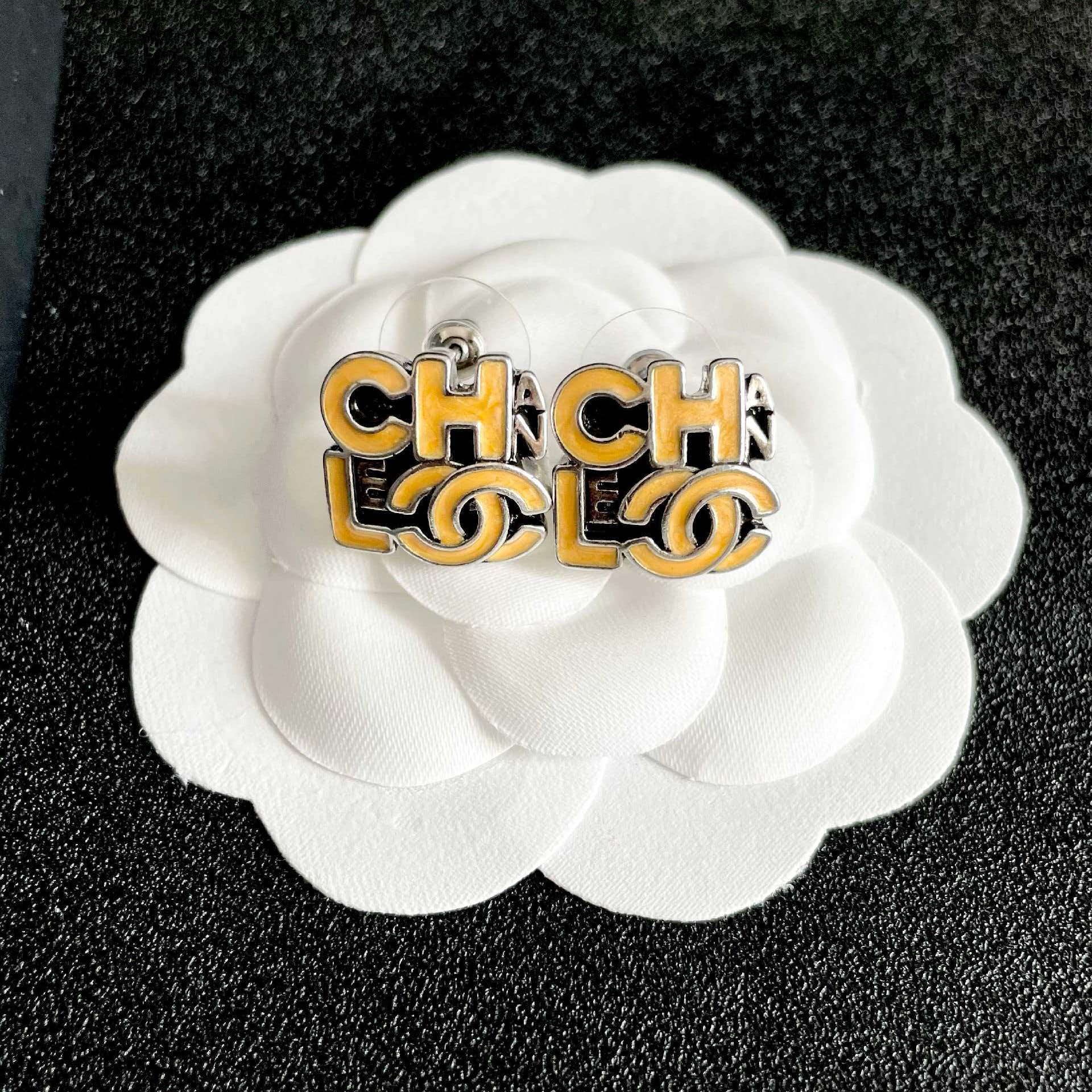Chanel Logo Stud Earrings