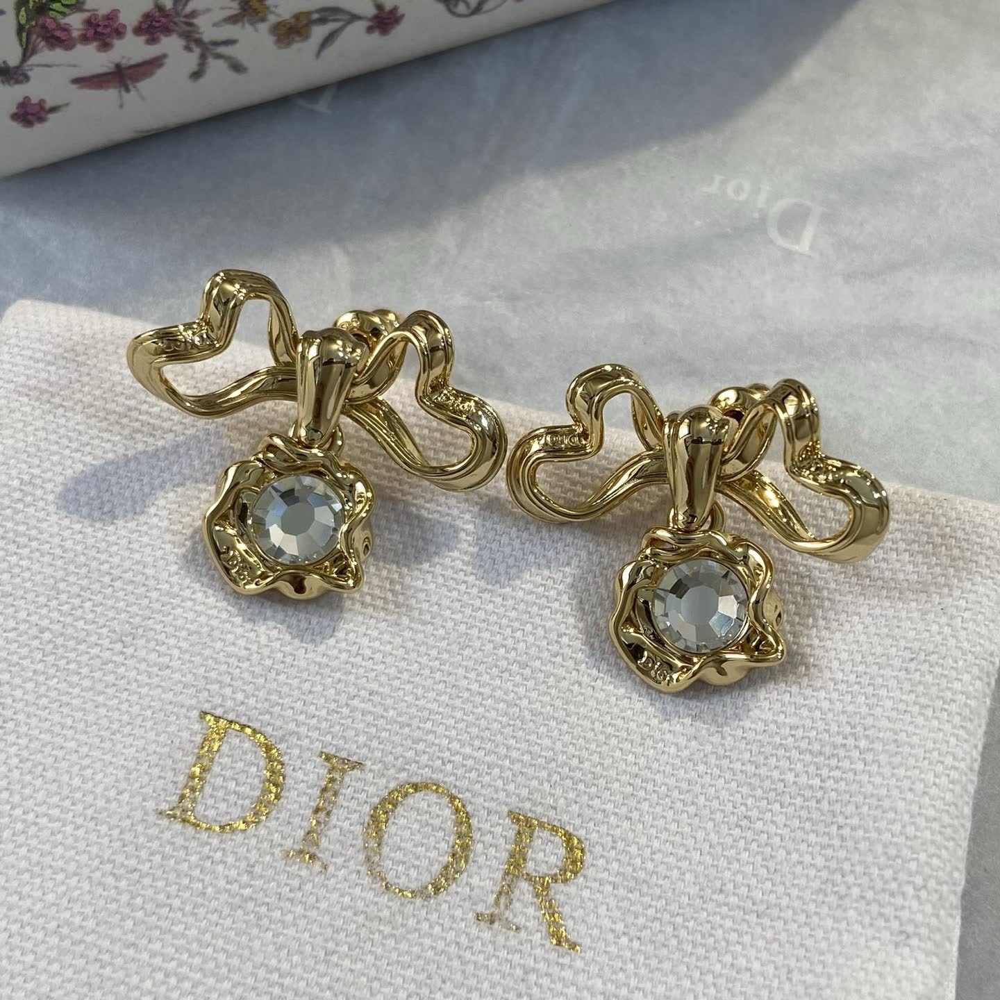 Dior Gold Tone Crystal Bow Earrings