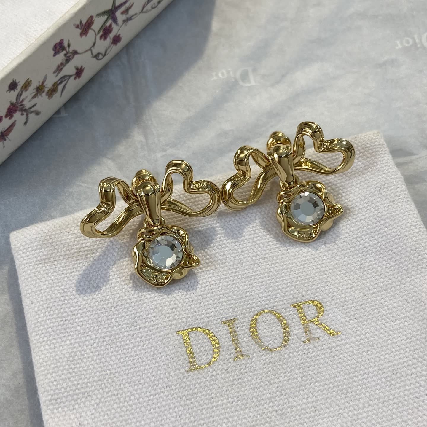 Dior Gold Tone Crystal Bow Earrings