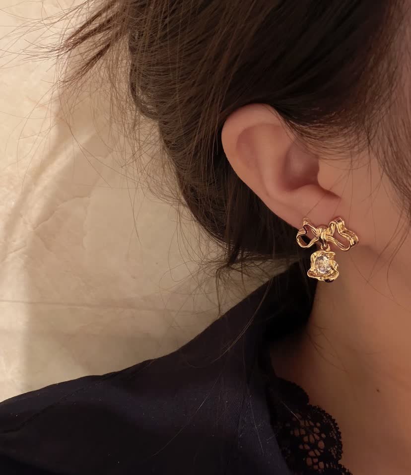Dior Gold Tone Crystal Bow Earrings
