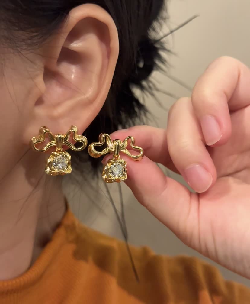 Dior Gold Tone Crystal Bow Earrings