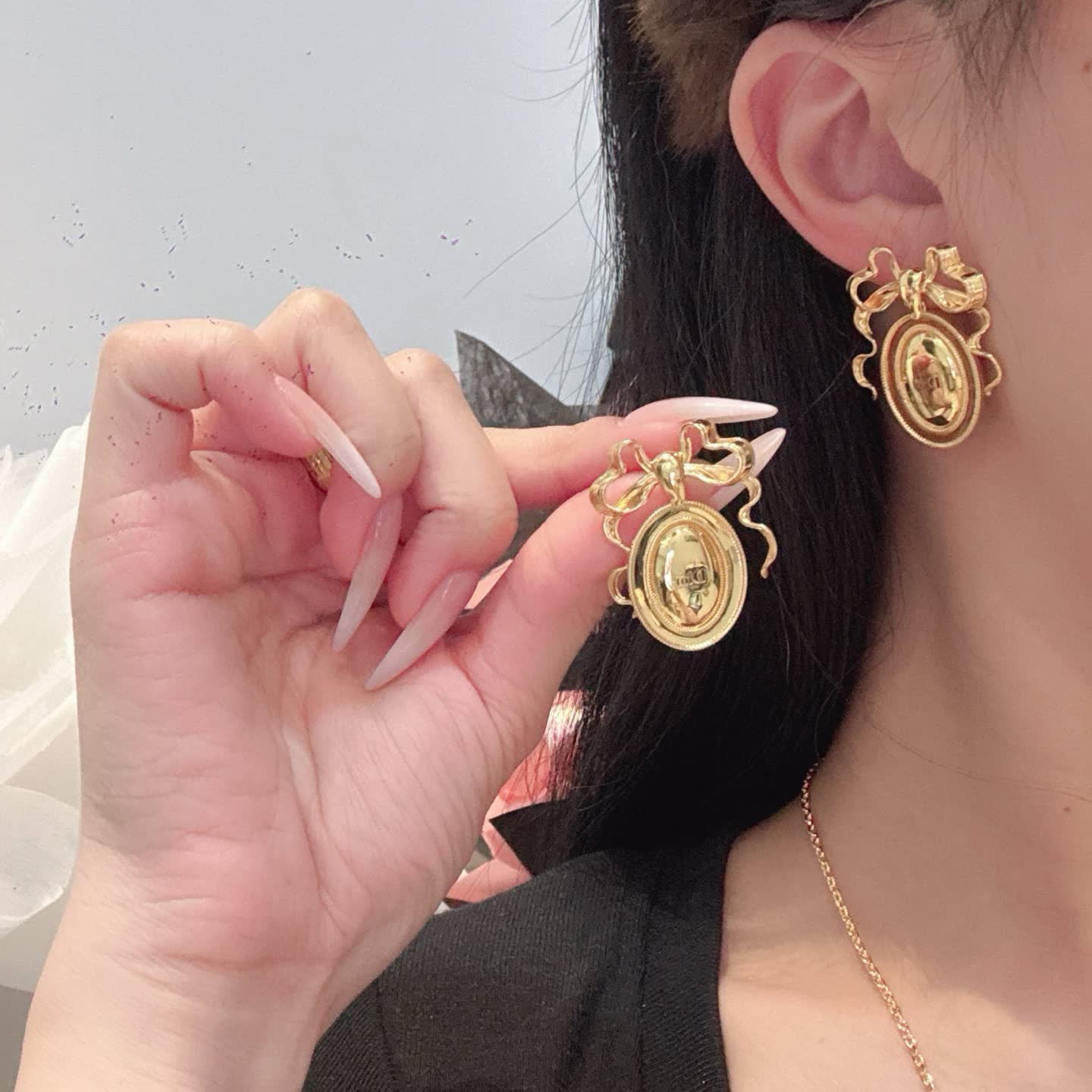 Dior Gold Tone Oval Cameo Earrings with Bow Detail Dior Gold Tone Oval Cameo Earrings with Bow Detail
