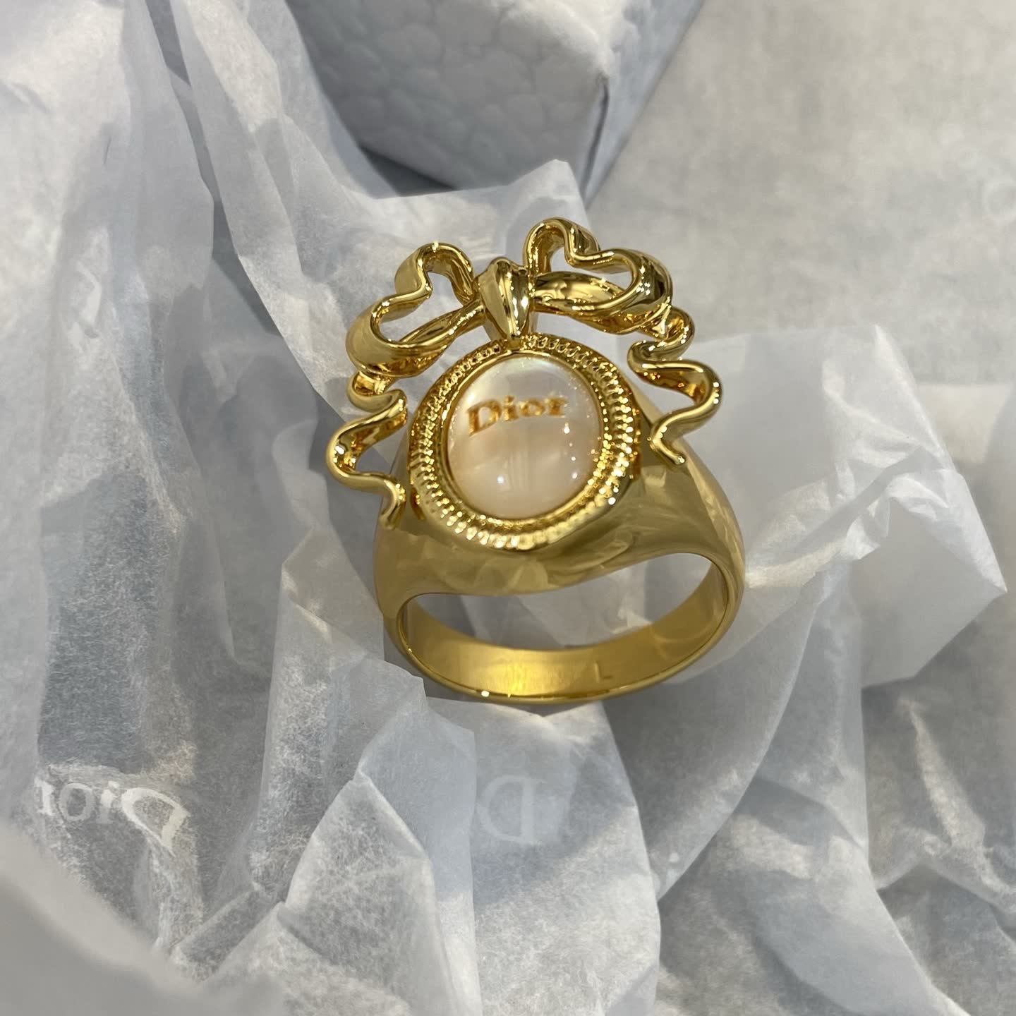 Dior Ring with Bow and Pearl Design