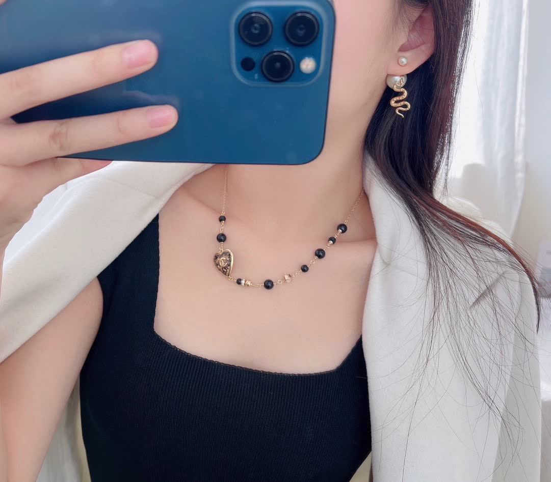 Dior Gold Snake Pearl Earrings