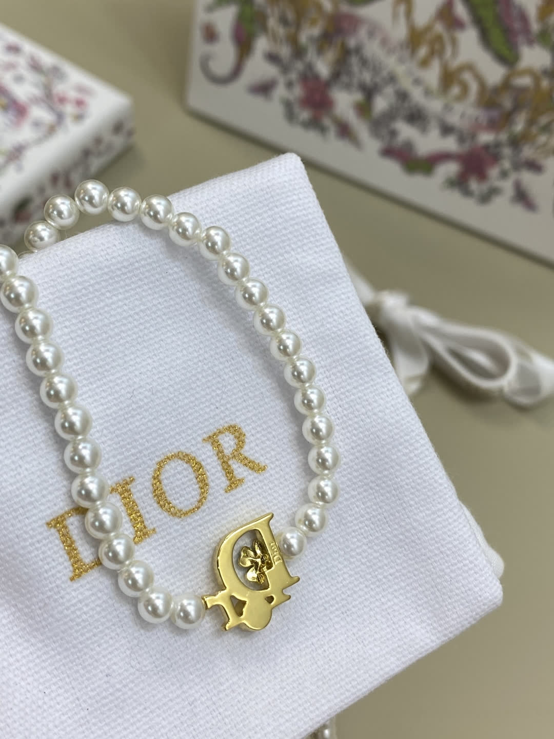Dior Pearl Necklace with Green Crystal Charm