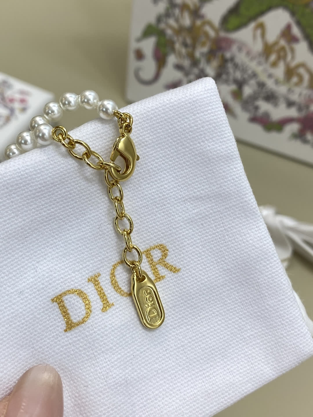 Dior Pearl Necklace with Green Crystal Charm