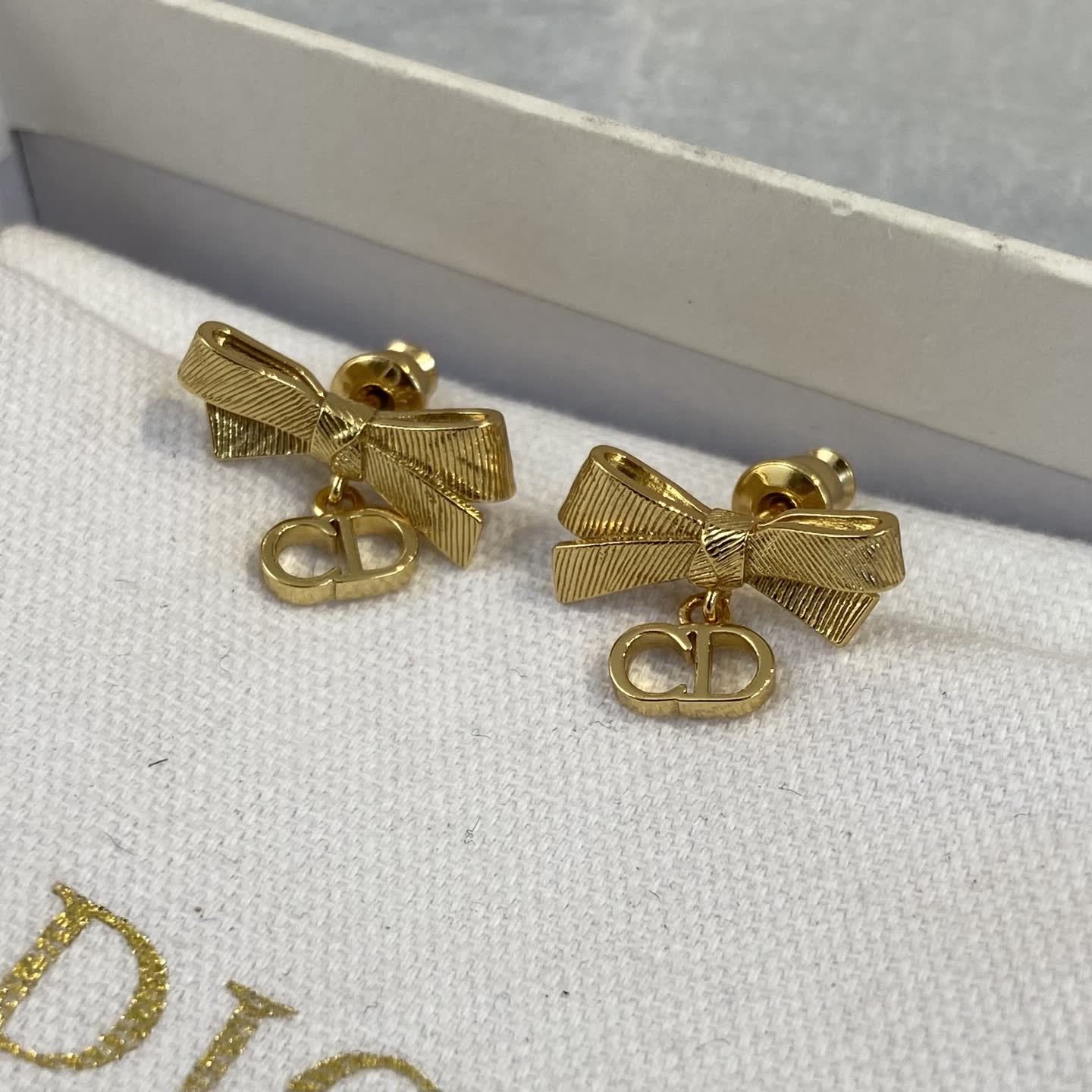 Dior Gold Tone Bow Earrings