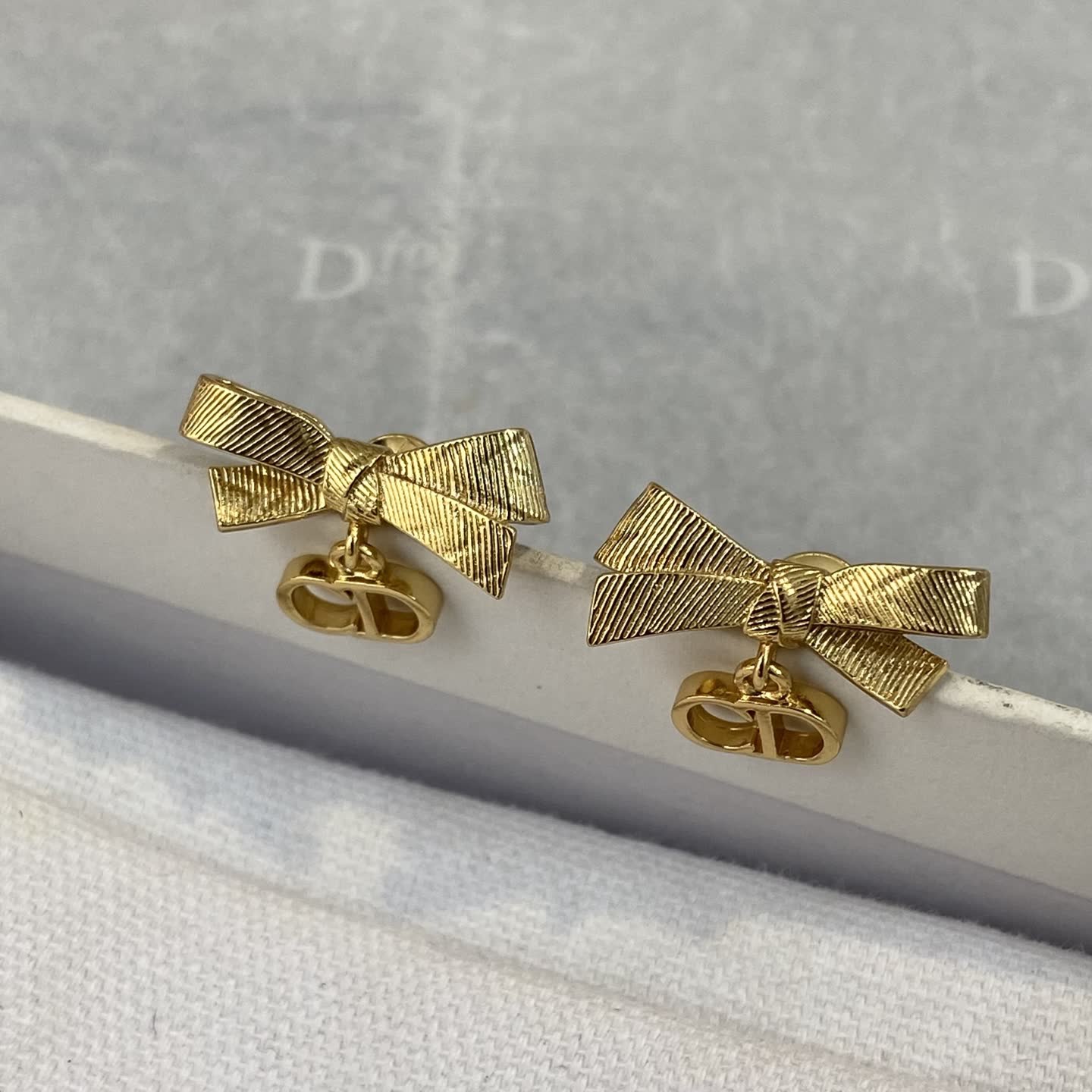 Dior Gold Tone Bow Earrings