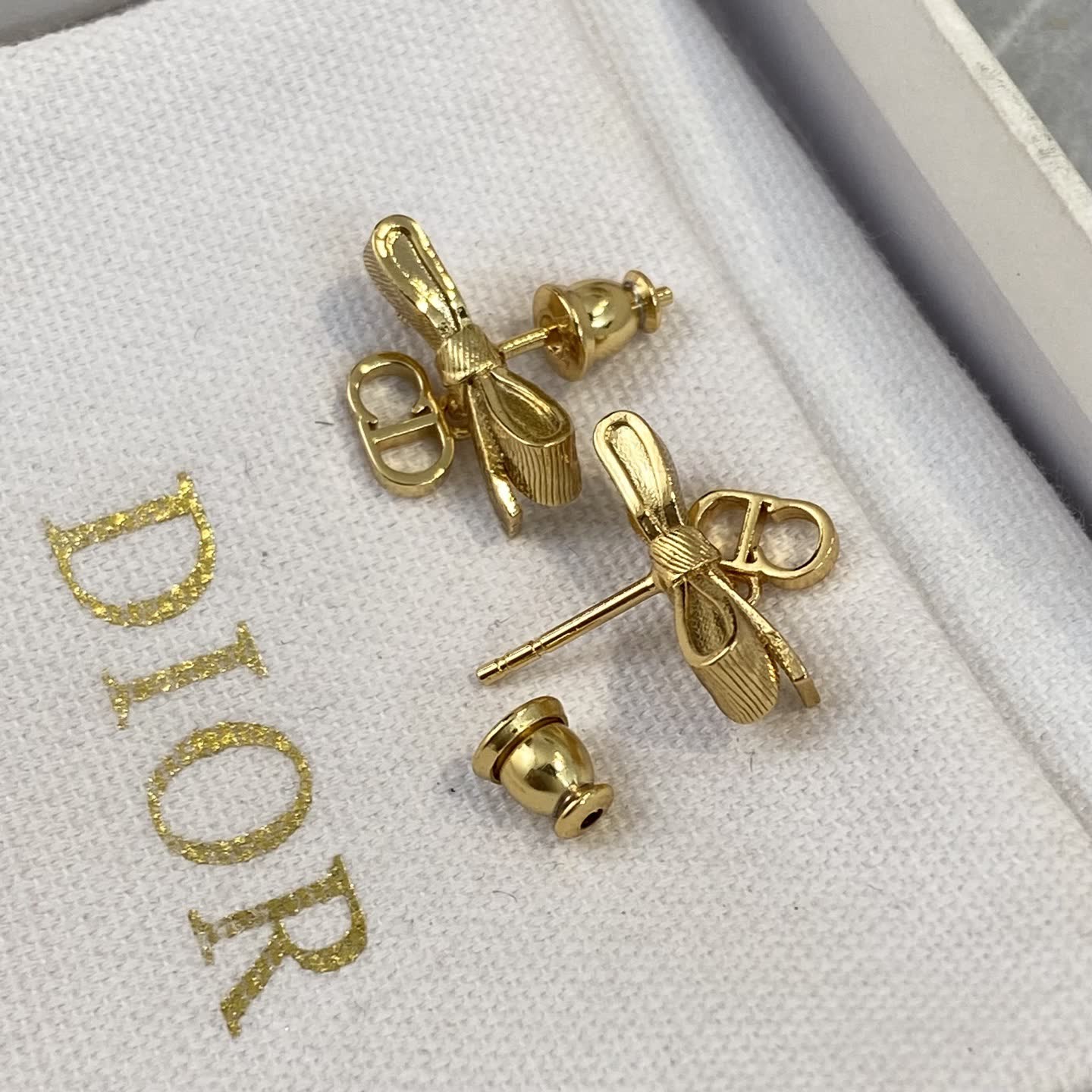 Dior Gold Tone Bow Earrings