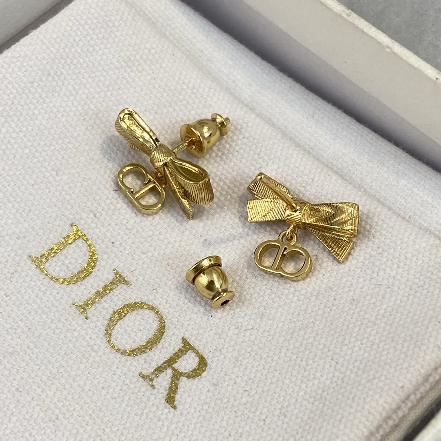Dior Gold Tone Bow Earrings
