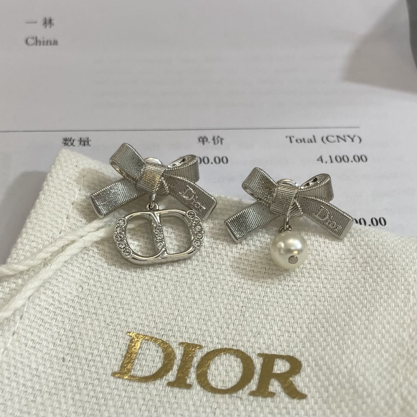 Dior Silver Bow Earrings with Crystal and Pearl Detail Dior Silver Bow Earrings with Crystal and Pearl Detail