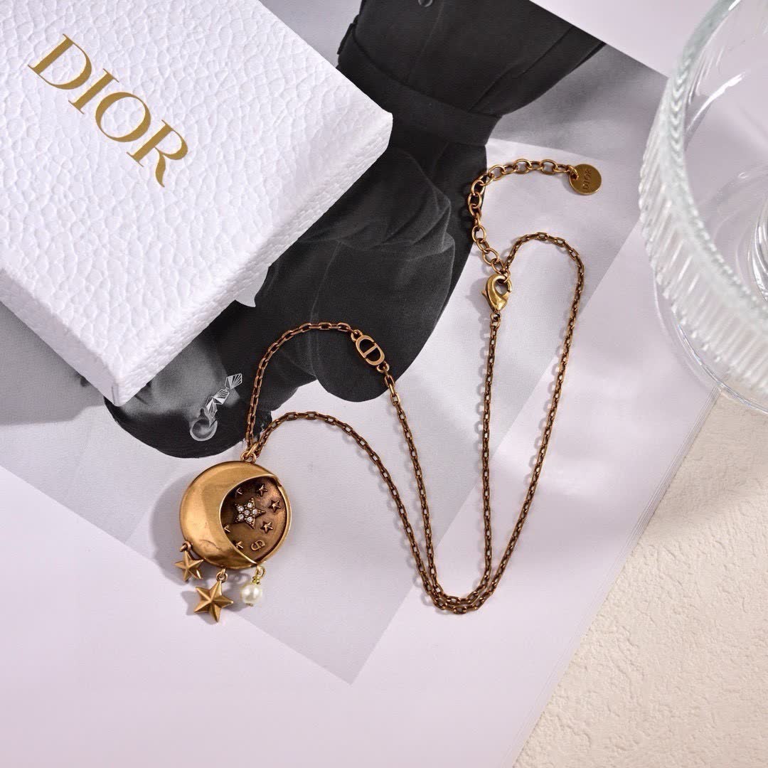 Dior Crescent Moon and Star Earrings Dior Crescent Moon and Star Earrings