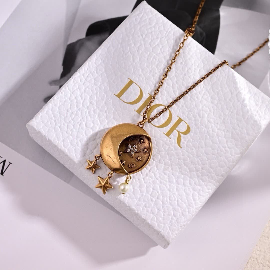 Dior Crescent Moon and Star Earrings