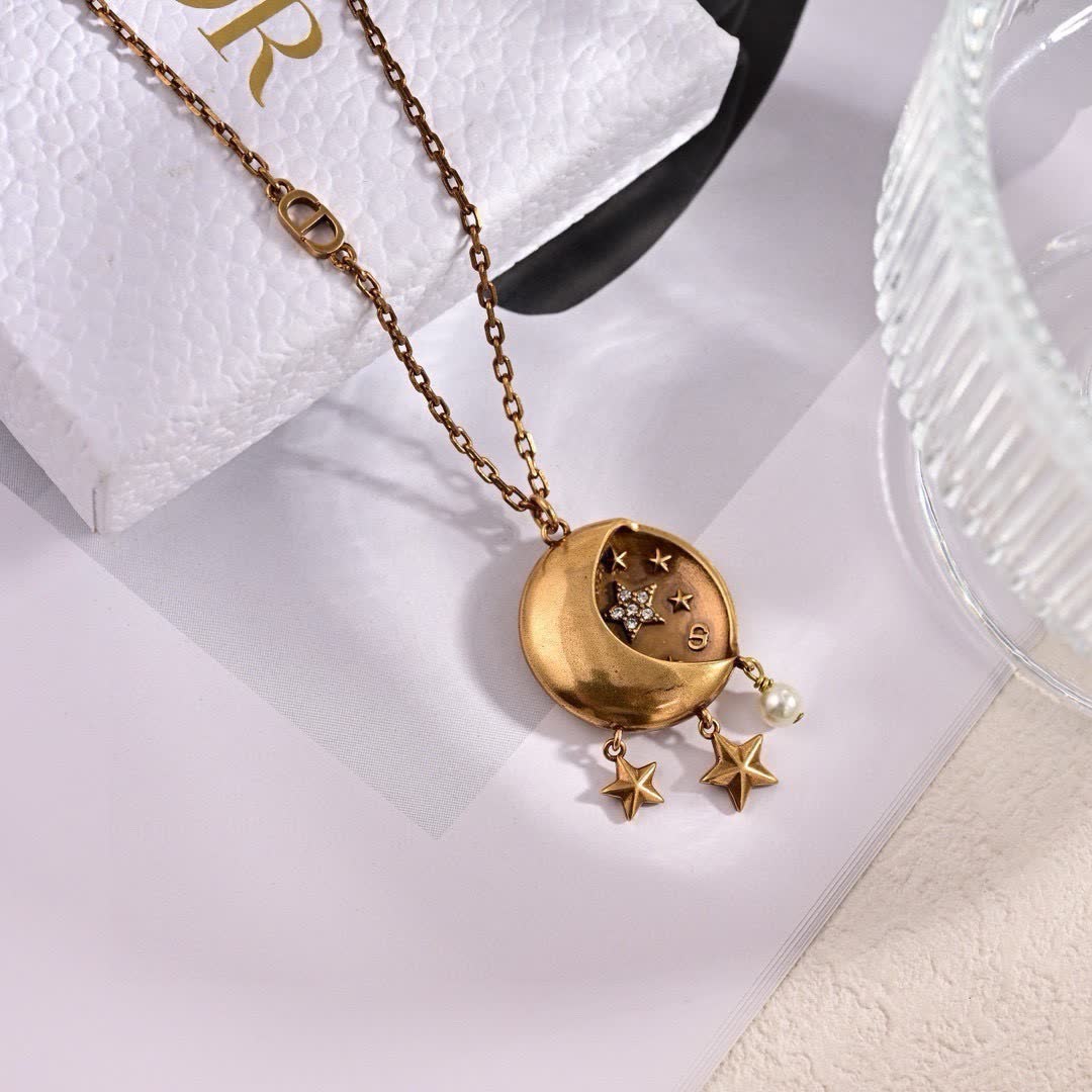 Dior Crescent Moon and Star Earrings