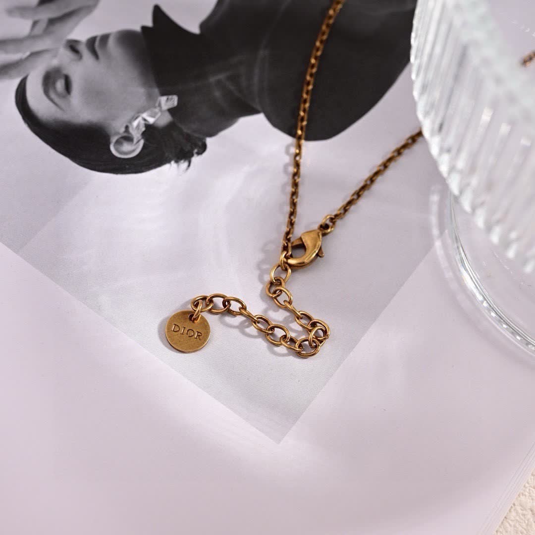 Dior Crescent Moon and Star Earrings