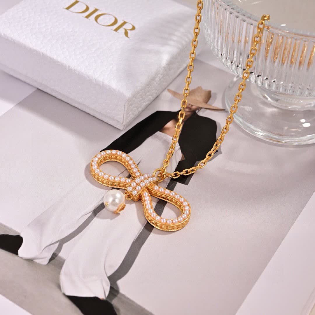 Dior Gold Tone Pearl Bow Earrings