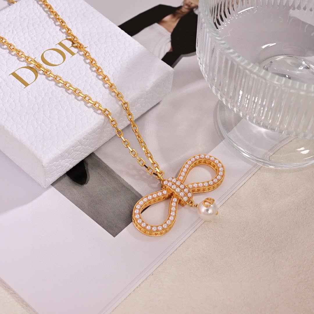 Dior Gold Tone Pearl Bow Earrings
