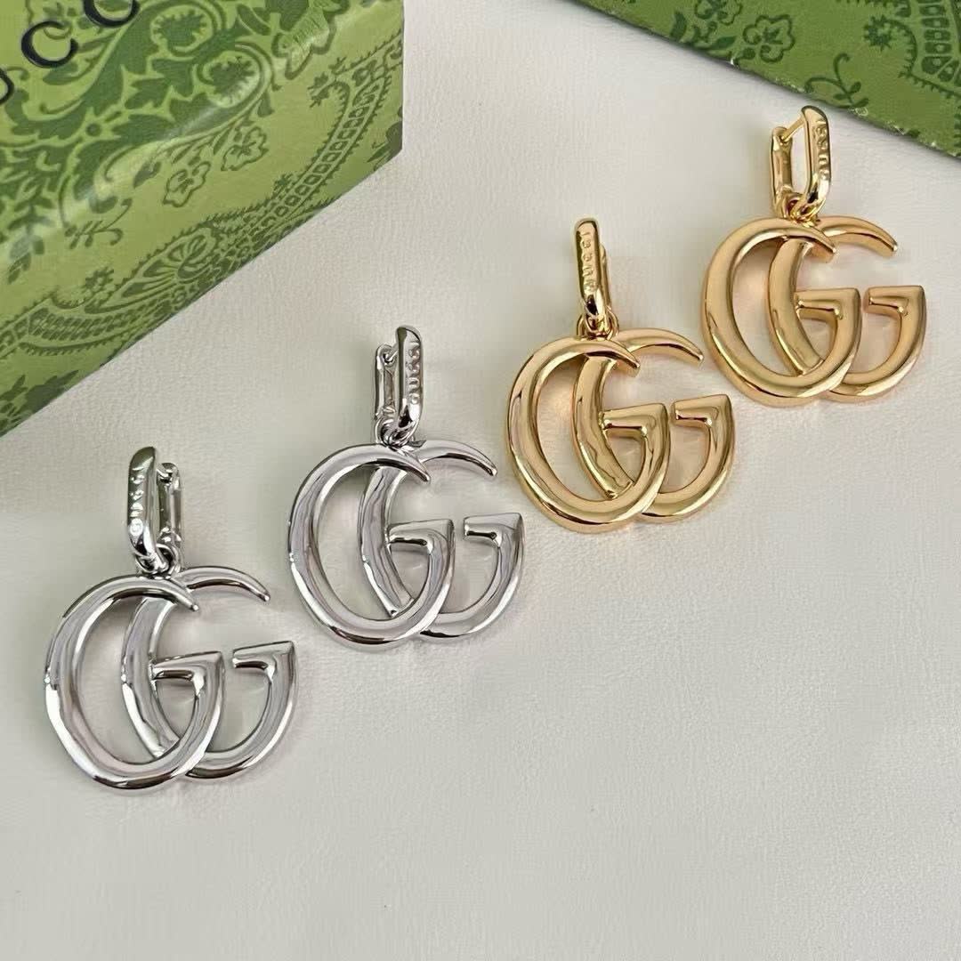 Gucci Gold Tone GG Logo Drop Earrings