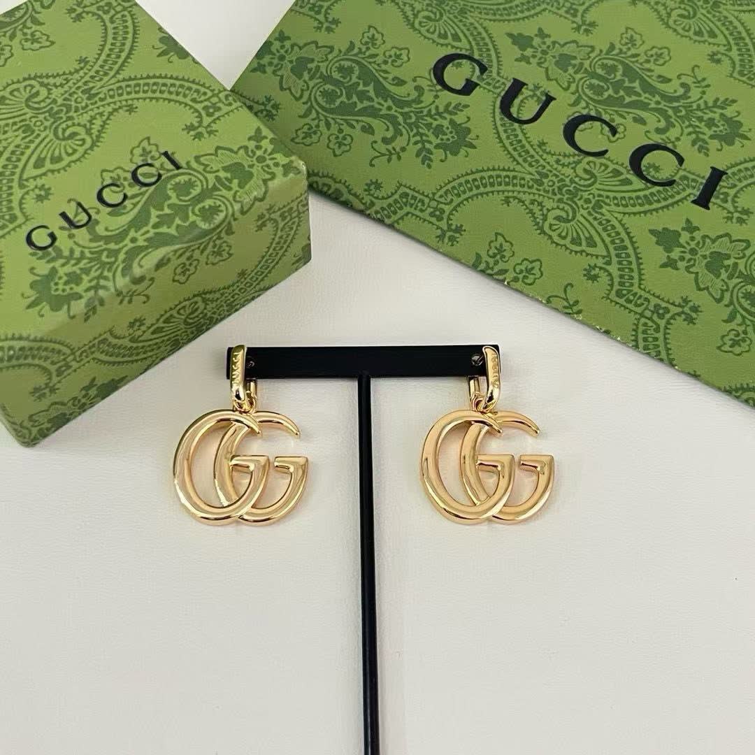 Gucci Gold Tone GG Logo Drop Earrings
