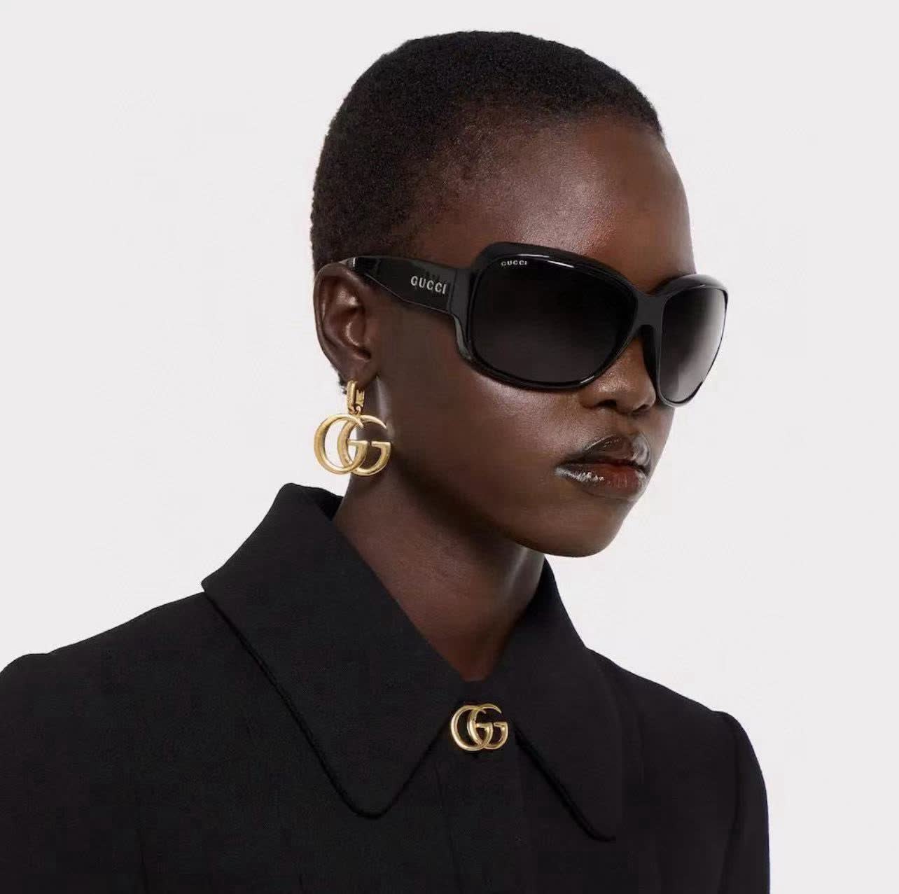 Gucci Gold Tone GG Logo Drop Earrings
