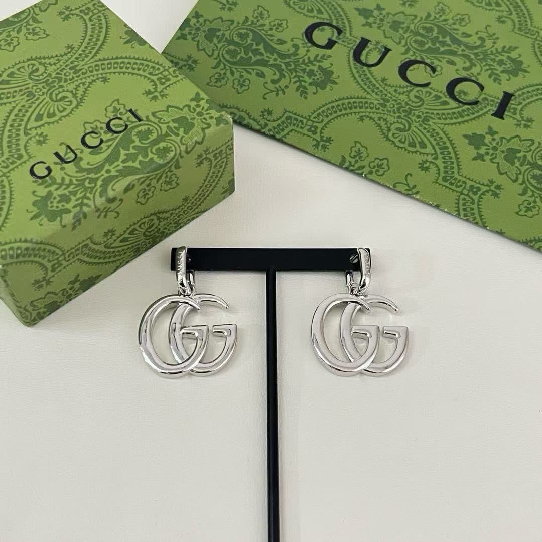 Gucci Gold Tone GG Logo Drop Earrings
