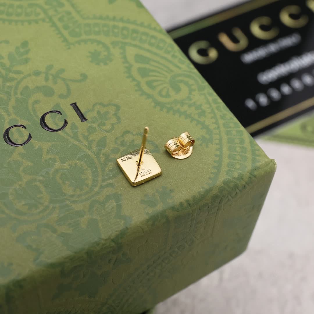 Gucci Gold Star Stud Earrings