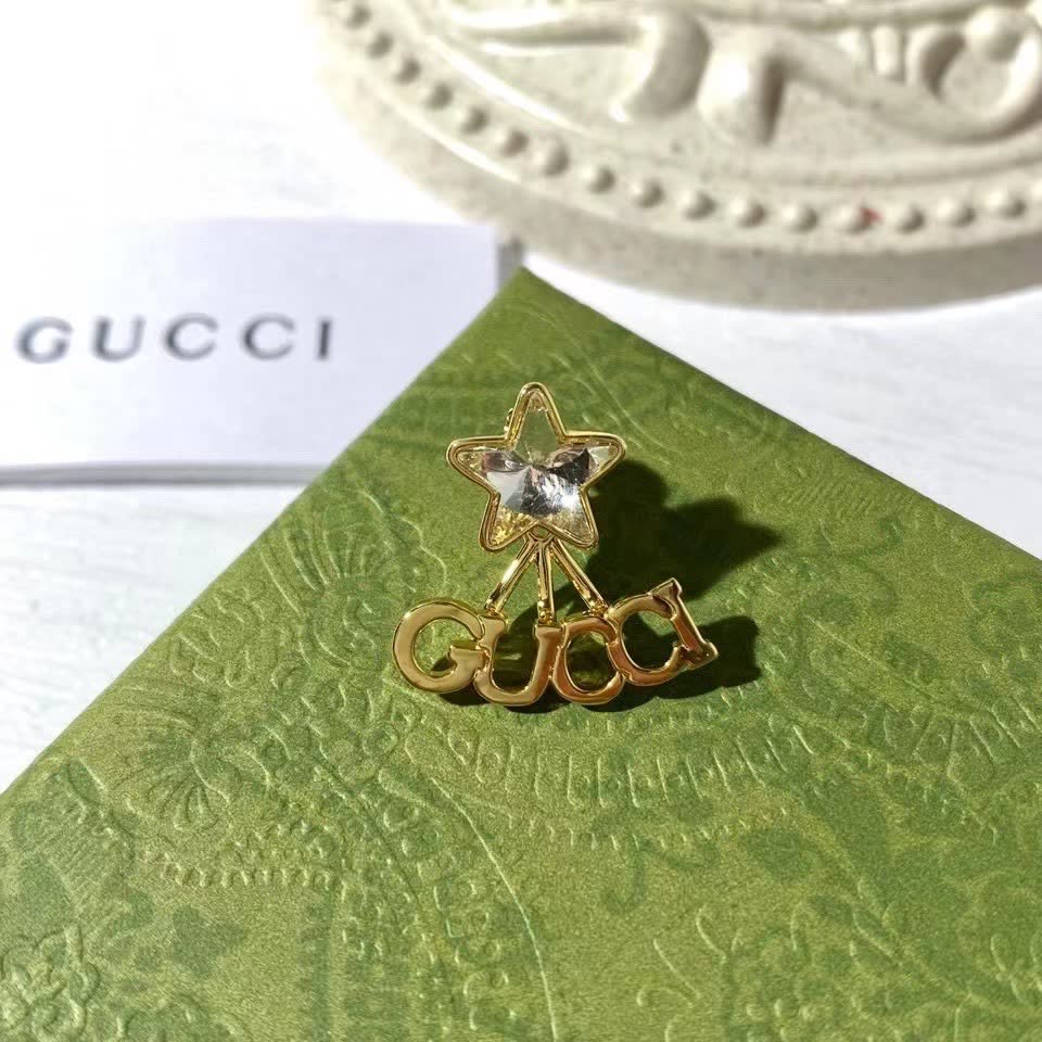 Gucci Gold Star and Letter Earrings